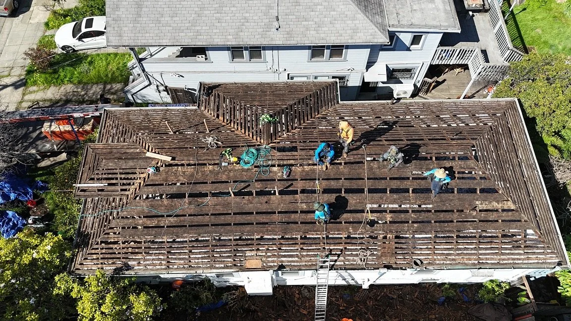 Oakland job with a lot of extras! 

This property hadn&rsquo;t had a roof tear off in at least 60 years. 2 layers of shingles on top of wood shake, on top of &lsquo;skip sheathing&rsquo; which you&rsquo;ll see in the photo. 

We added a new layer of 
