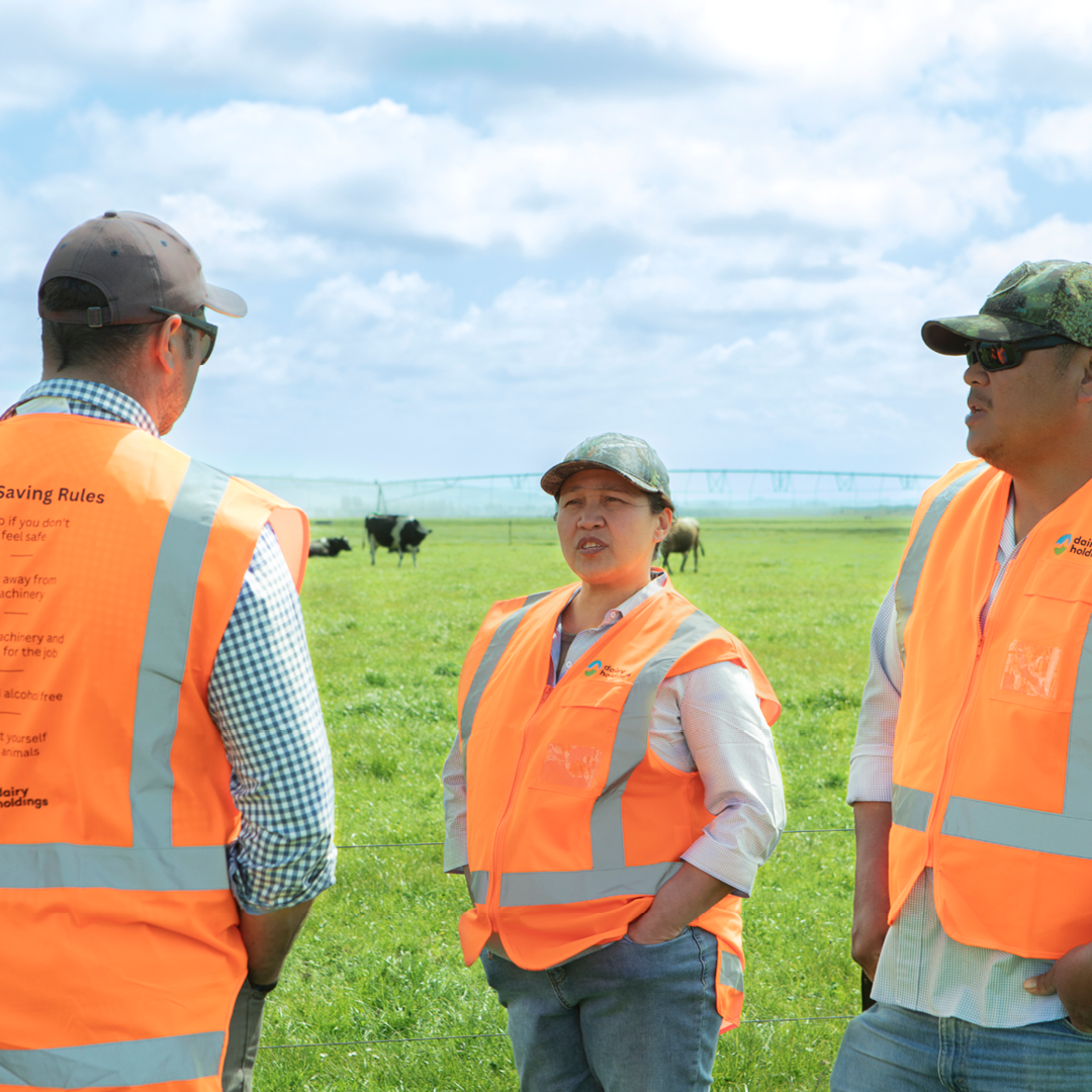 2-0_ DHO0027_Dairy Holdings_team members in conversation .png