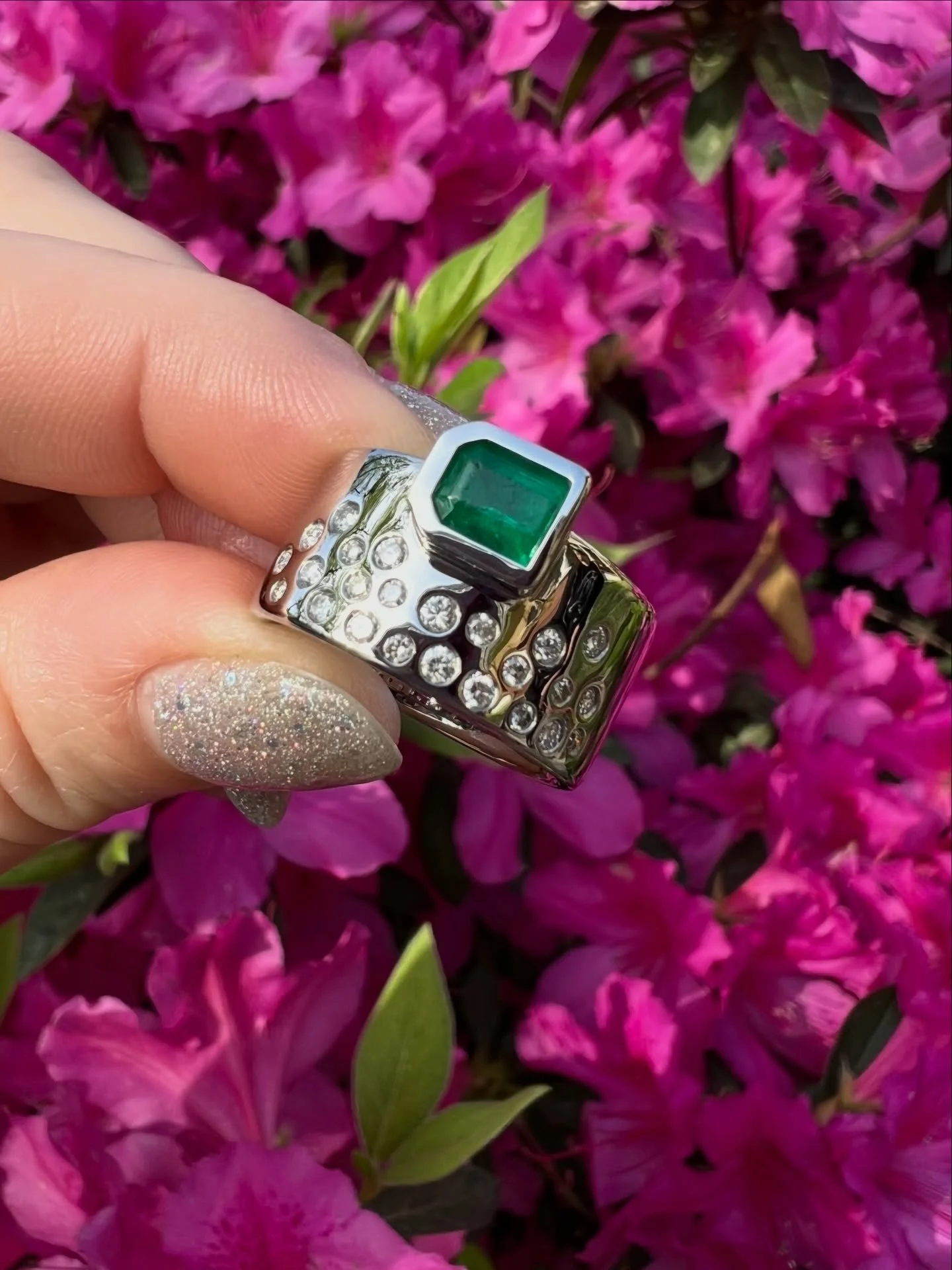 Adrienne came to me with a stunning (but broken) emerald-cut emerald she&rsquo;d been wearing as her engagement stone.

We talked about how to save it, not replace it.

Using her heirloom diamonds from a few older pieces, I reworked everything into a