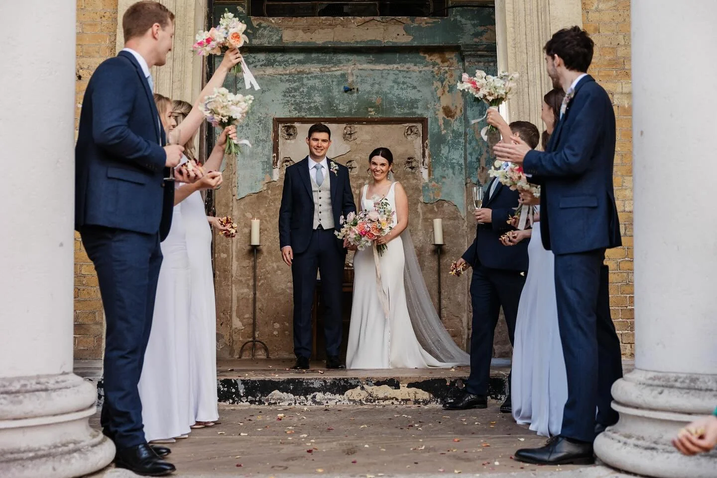 A magical moment for Mia and Matt at the Asylum Chapel @maverickprojects last Summer ✨

Mia carried a bouquet brimming with the best of British summer - blousy garden roses, fragrant philadelphus, and delicate sweet peas, locally grown and bursting w