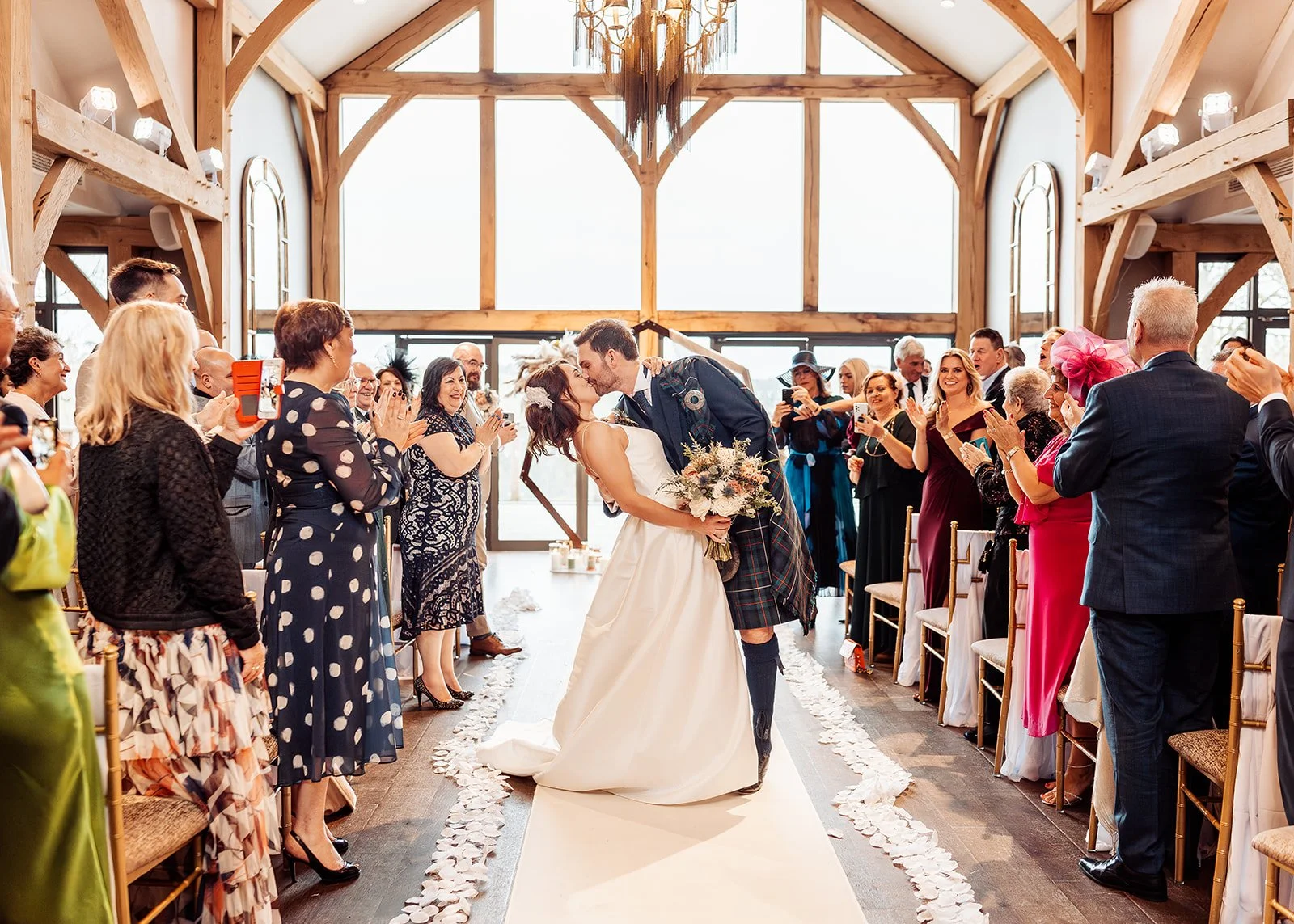 wedding-kiss-enterkine-house-ayrshire-david-long-aisle-dip.jpg