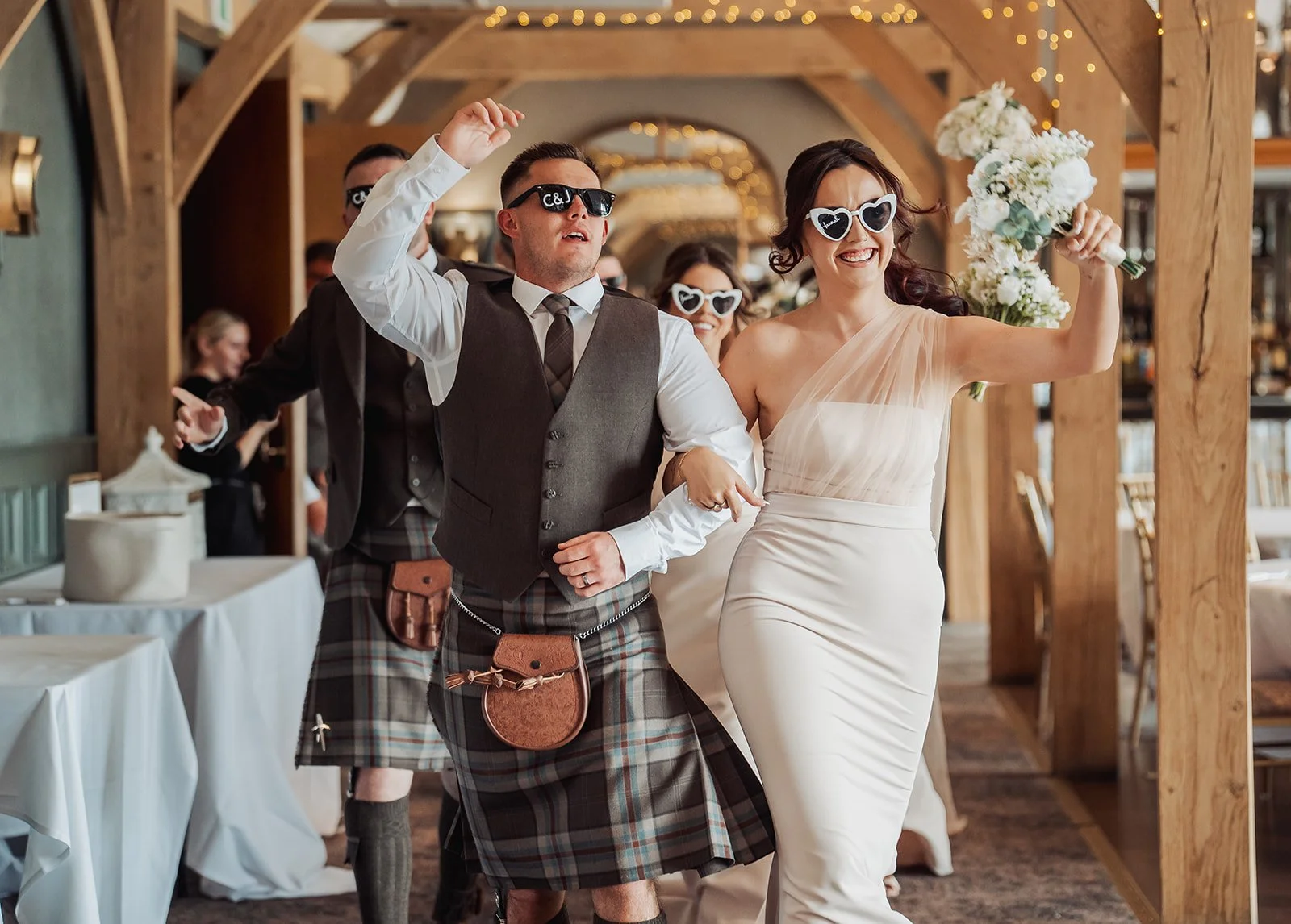 enterkine-house-wedding-venue-ayrshire-david-long-photography-dinner-groomsman-bridesmaid-entrance.jpg