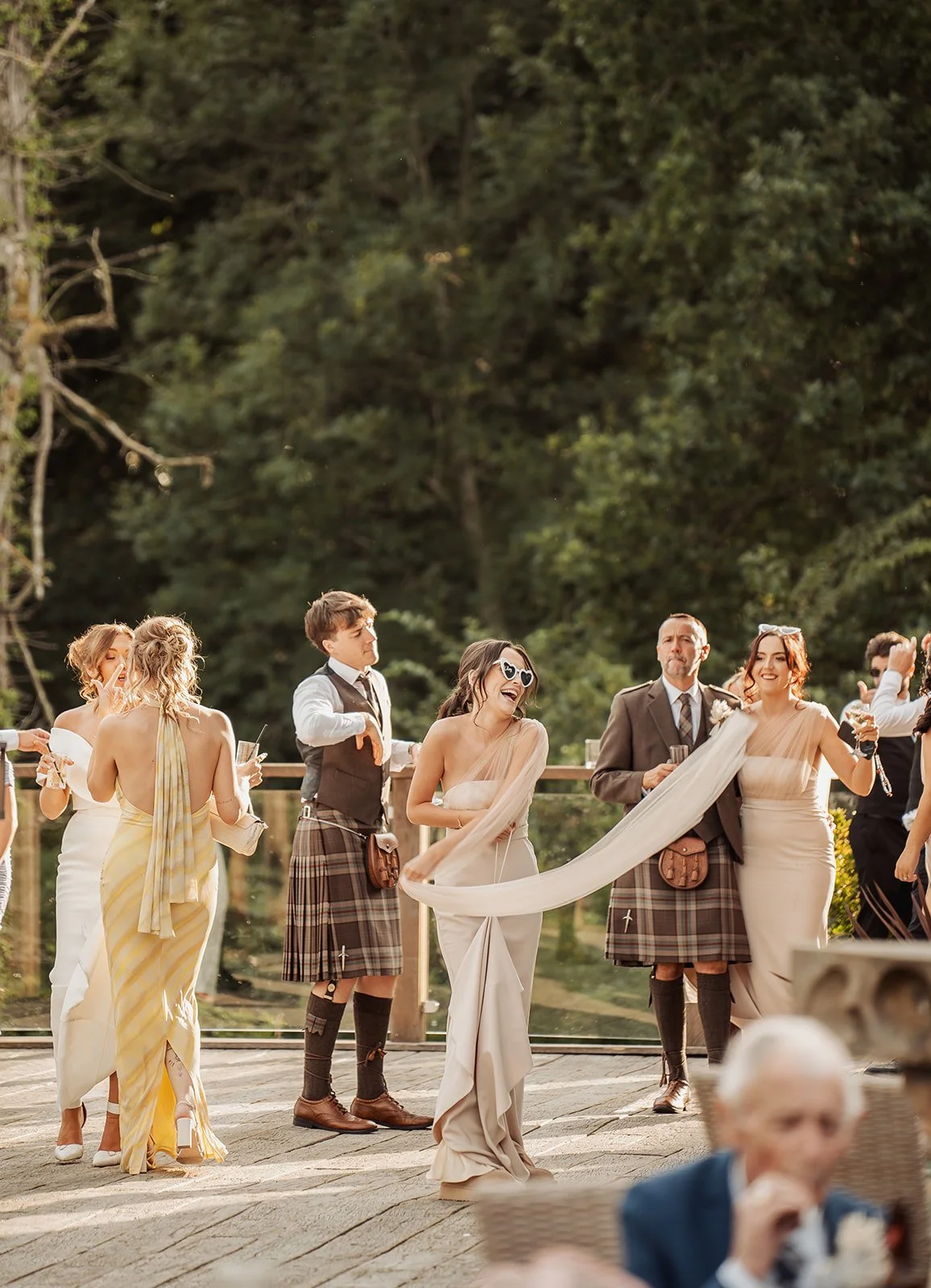 enterkine-house-wedding-venue-ayrshire-david-long-photography-dancing-outside-decking.jpg