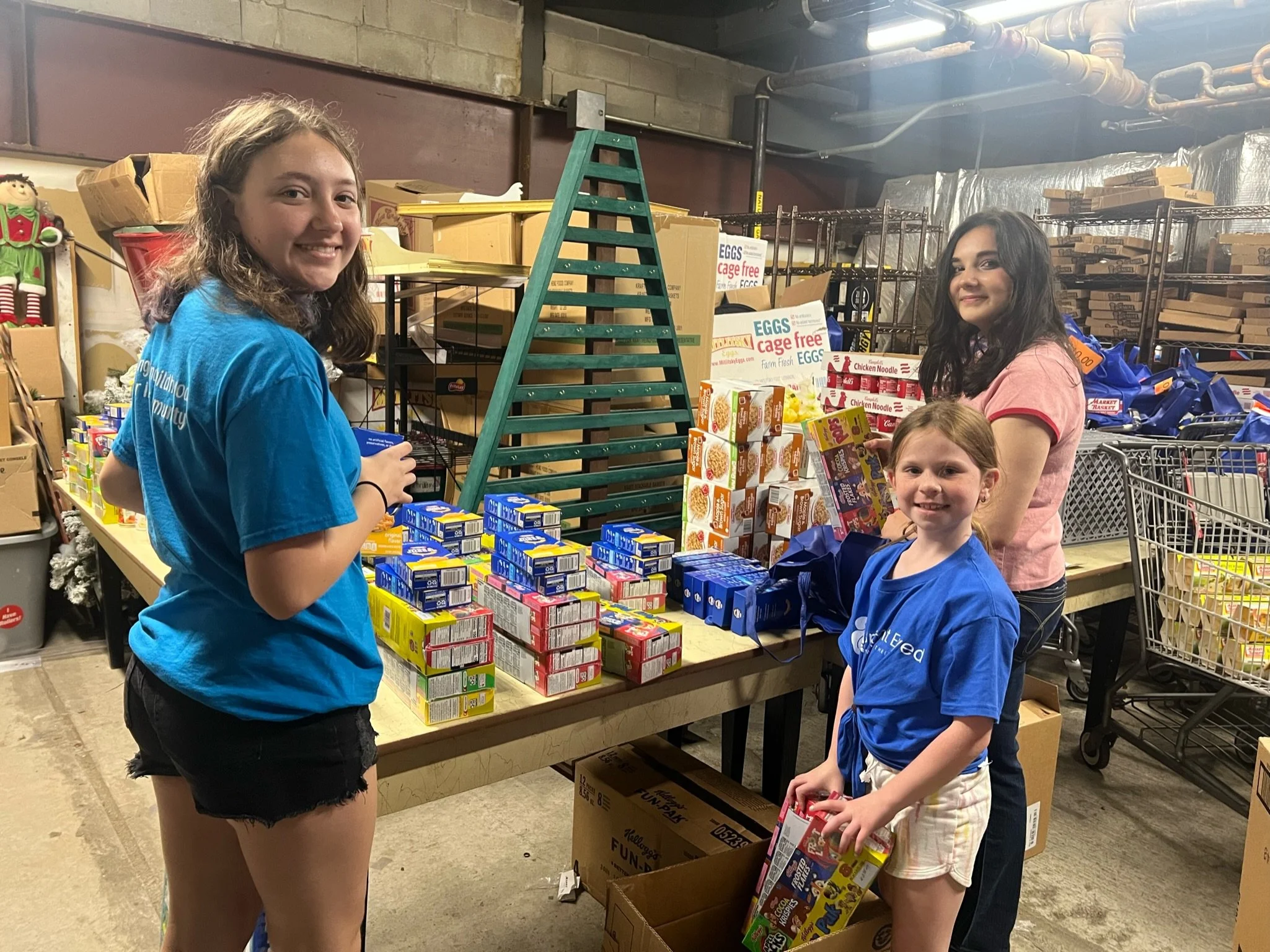 Youth Volunteers Packing Totes