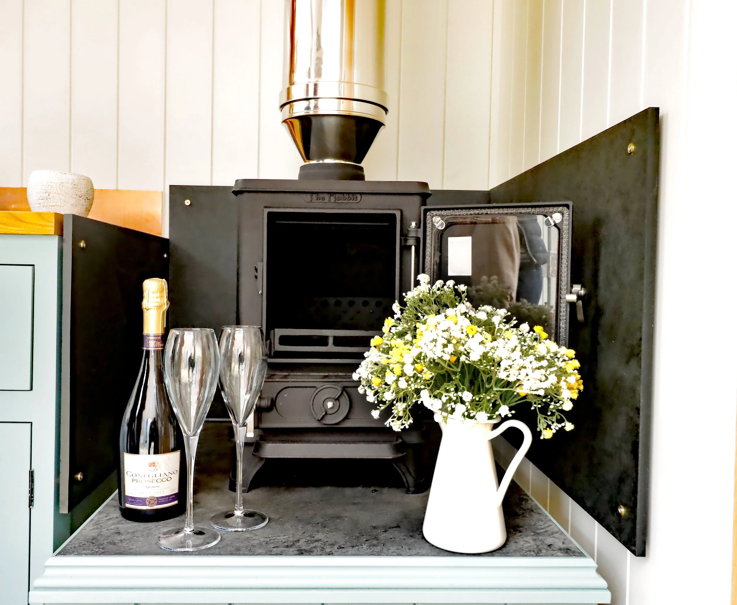 Wood burner at Stargazey at Moonshadow Luxury Shepherd Huts in Cornwall