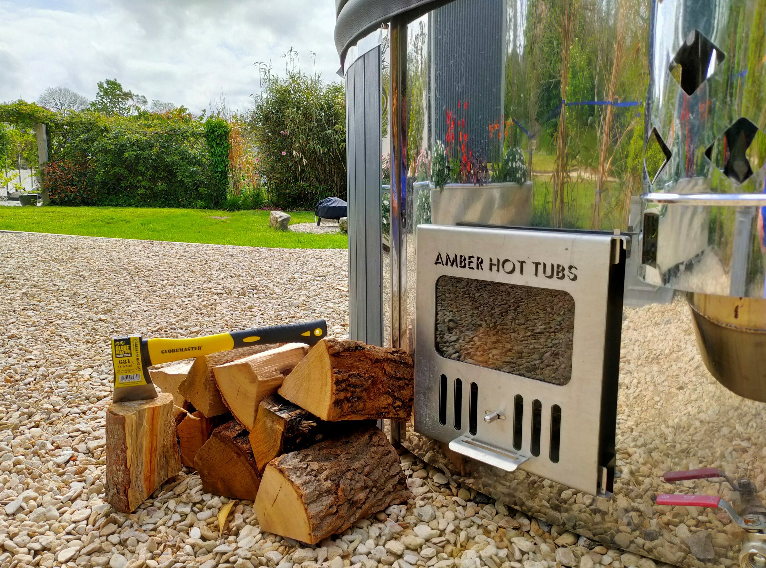 Amber wood fired hot tub at Stargazey at Moonshadow Luxury Shepherd Huts in Cornwall