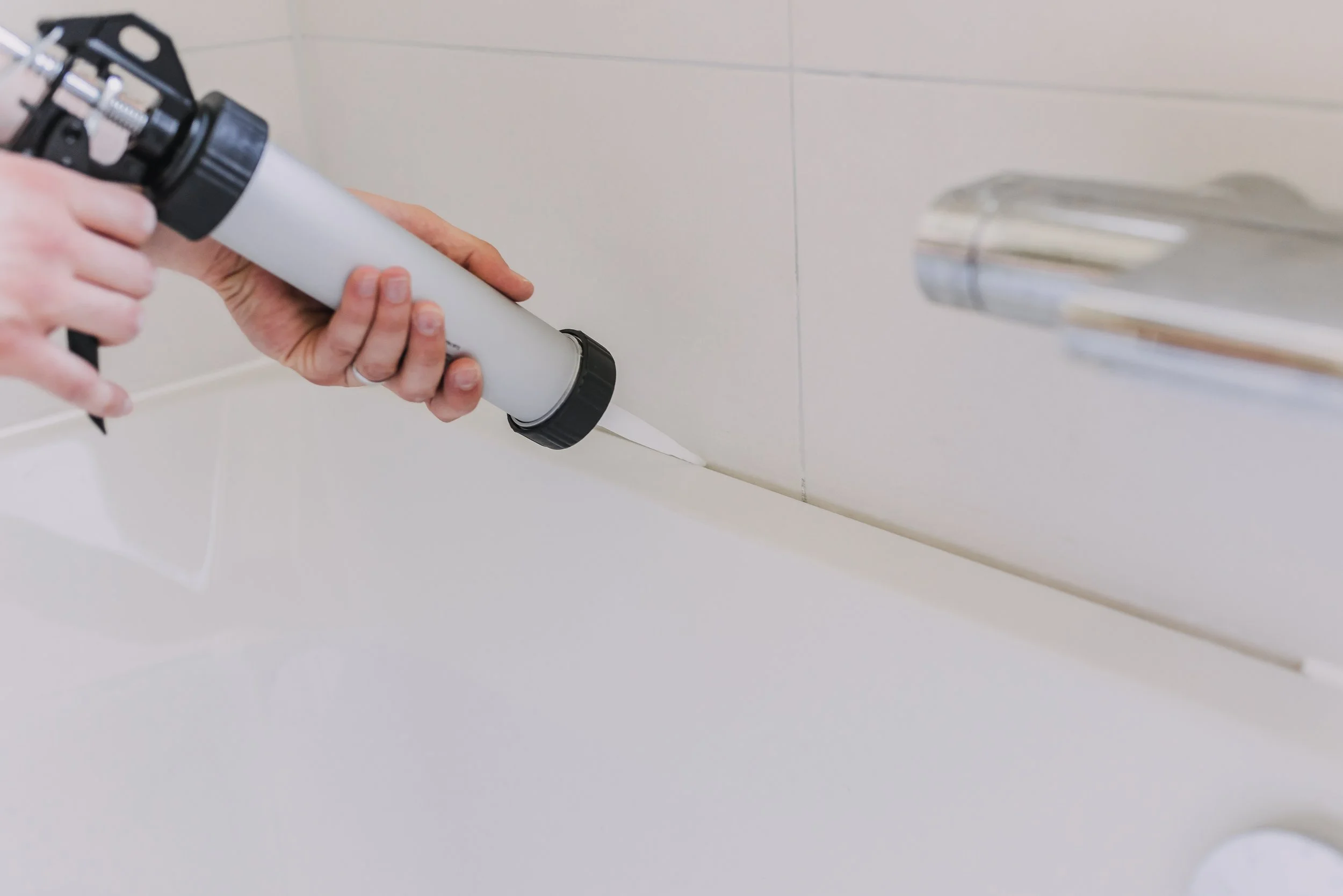 silicone sealing around basins, showers, baths and and sinks.