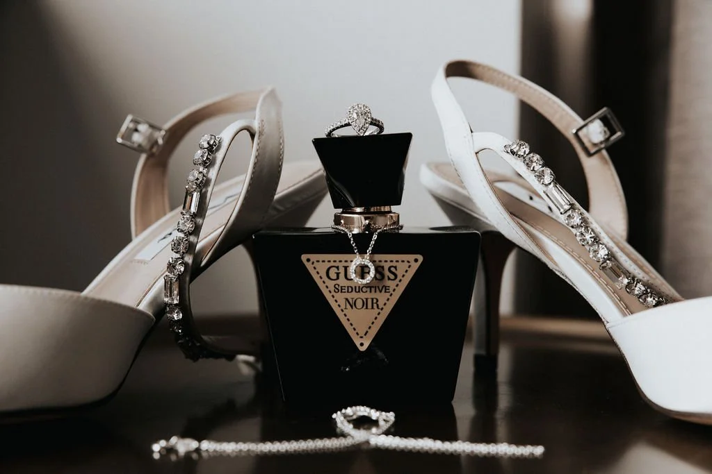 Wedding shoes, perfume, jewellery and engagement ring arranged for Carla and Amie’s wedding