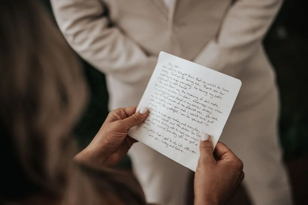 Handwritten wedding letter being read during Allysha and Corey’s wedding preparations