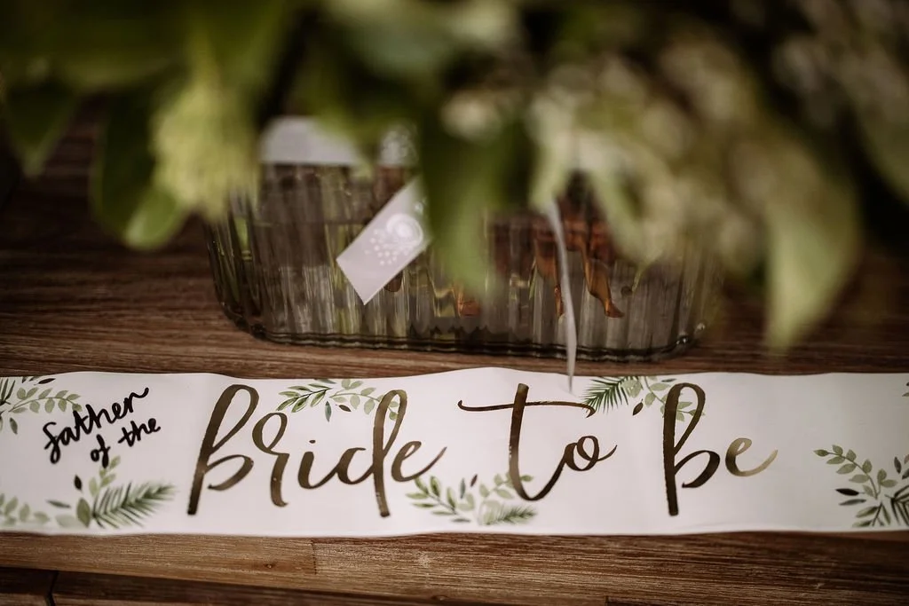 Bride-to-be sign and wedding details photographed during Maddison and Cody’s wedding day