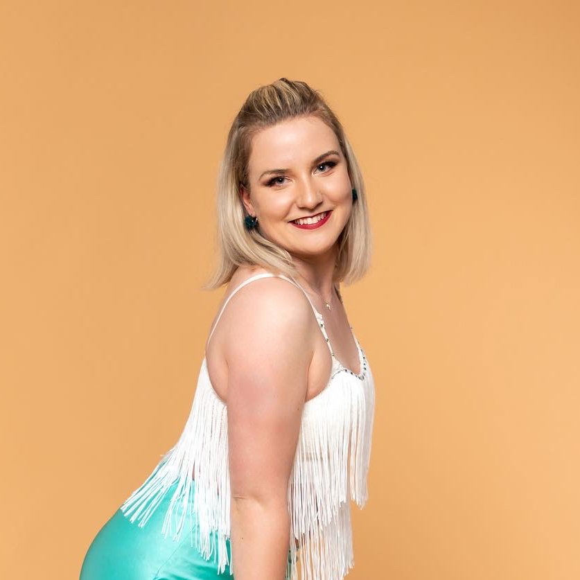 Female dance teacher smiling