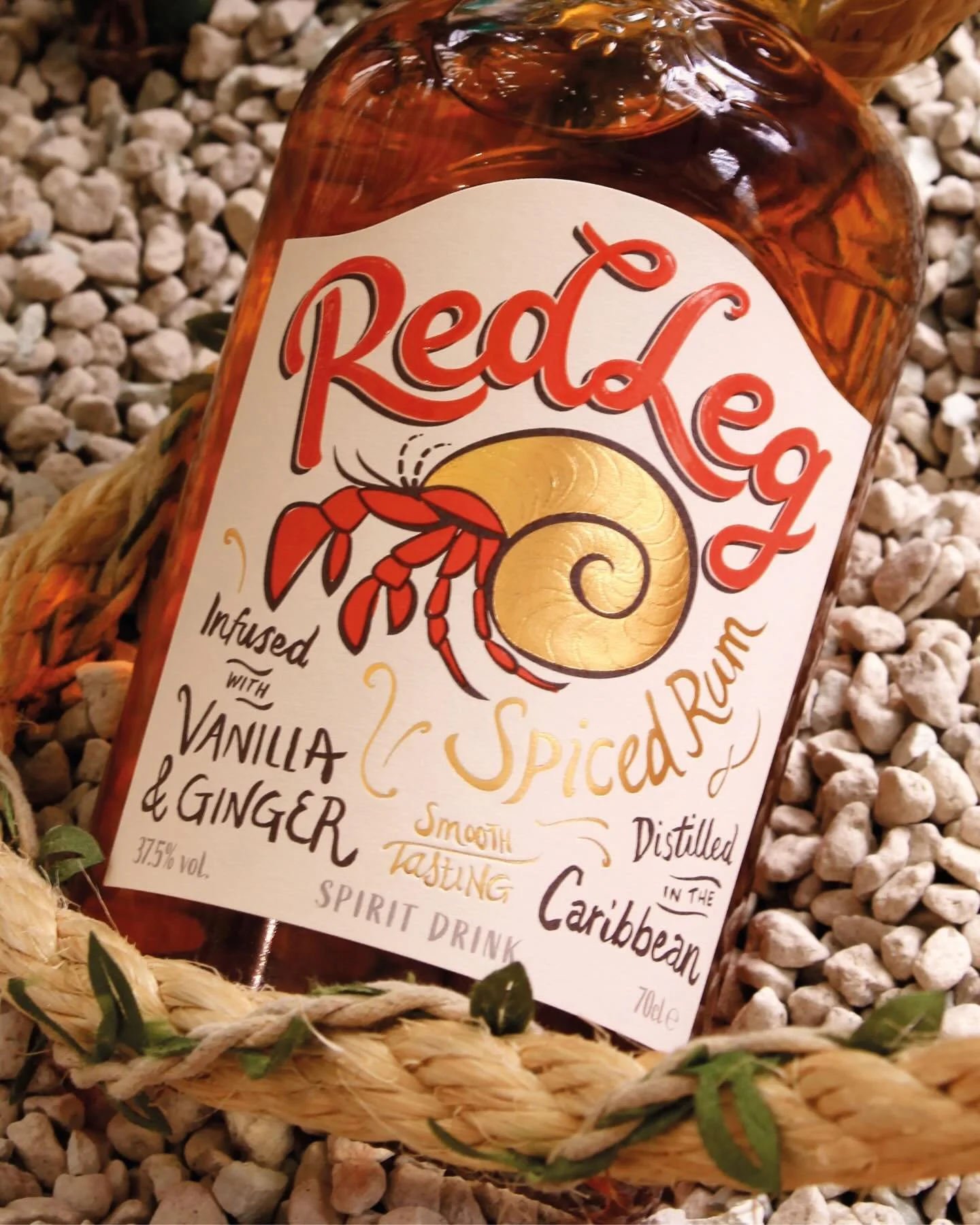 We made the bold suggestion to change the RedLeg label from a dark brown to a brighter warm cream, and use a bright red for the RedLeg brand colour, to improve shelf standout. 

The RedLeg crab was finished in warm gold foil, with a gloss high-build 