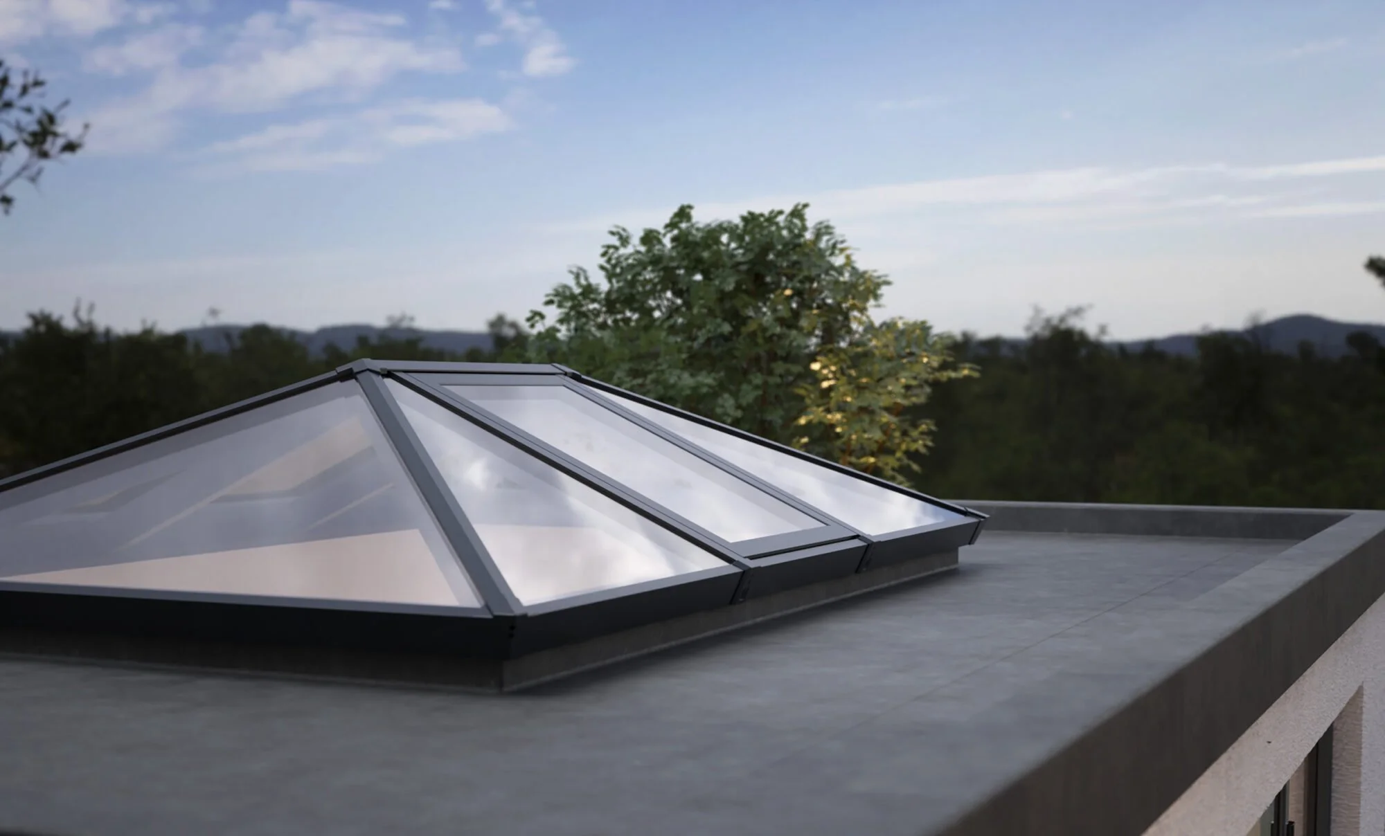 A rooftop with a glass skylight, surrounded by trees and a scenic sky with some clouds in the distance.