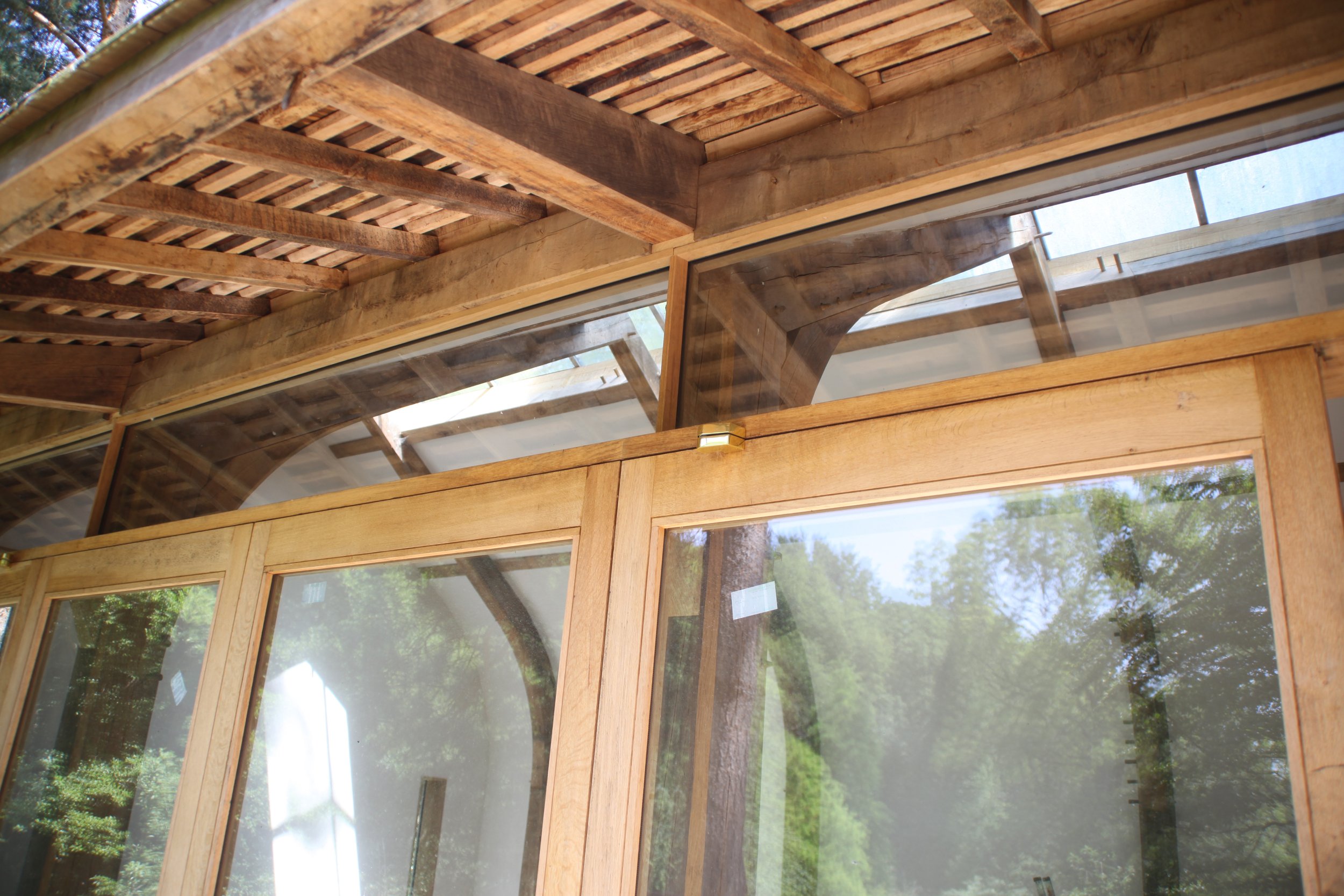 Overhanging eaves and oak-framed doors