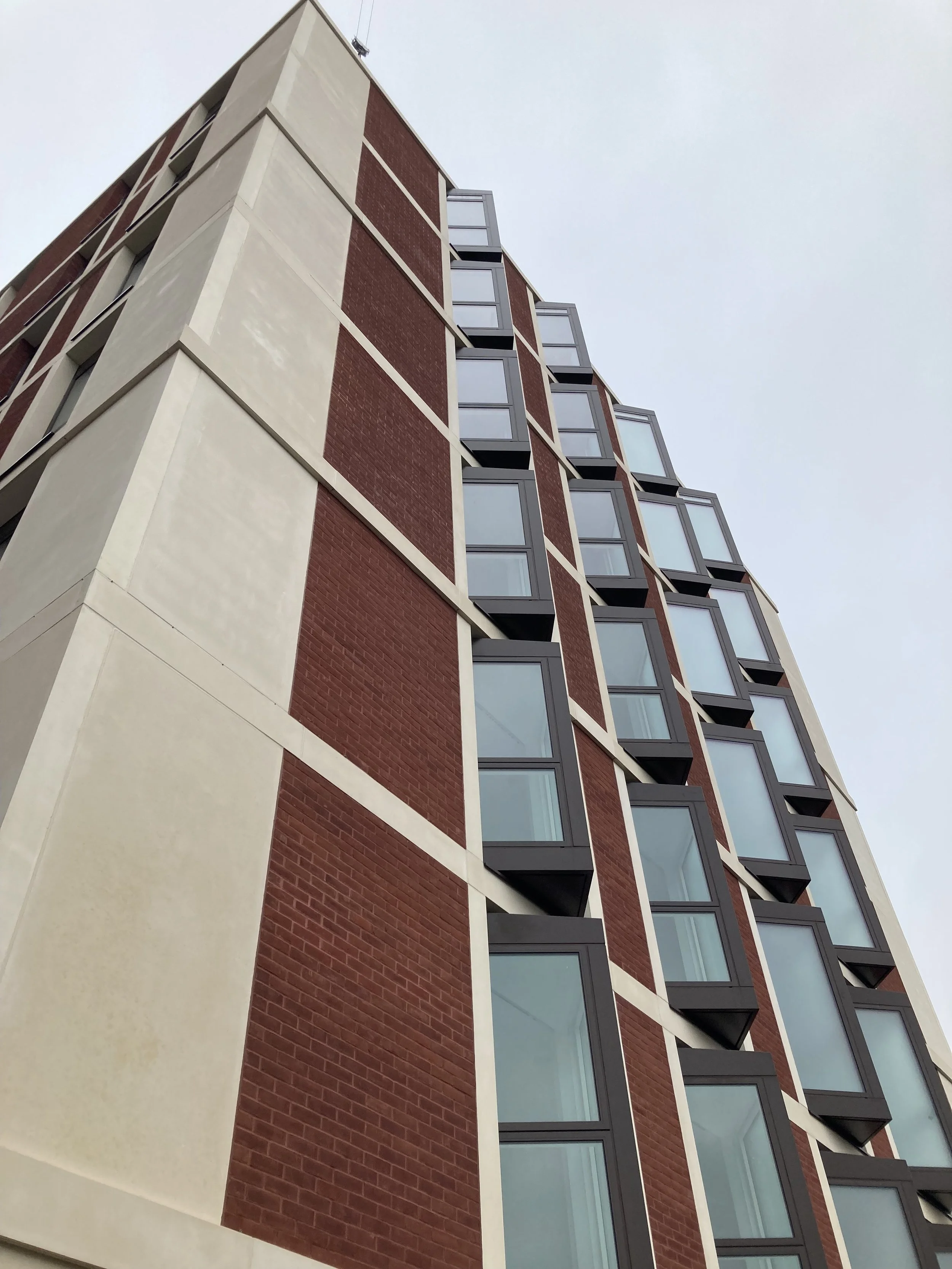 Obique bay windows near site boundary