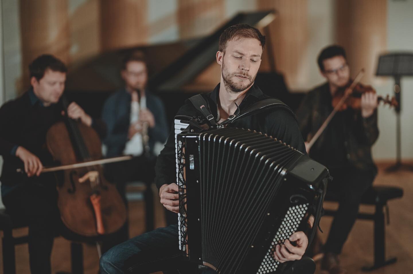 Our youngest member is accordionist Bogdan Laketic, who actively performs all over the world at illustrious festivals and venues, as a soloist or a member of his other ensemble, prize-winning Duo Aliada. He is also just politely laughing when he does