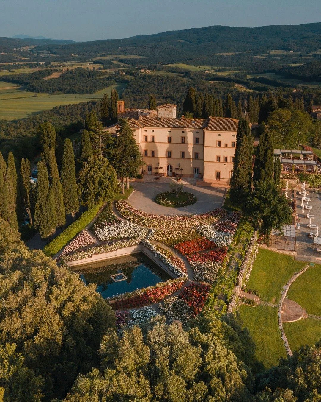 Some addresses carry centuries of history. Castello di Casole carries ten.

Once a noble estate, this Belmond retreat is set on 4,200 acres of rolling Tuscan hills. Vineyards, olive groves, and cypress-lined roads surround the restored 10th-century c
