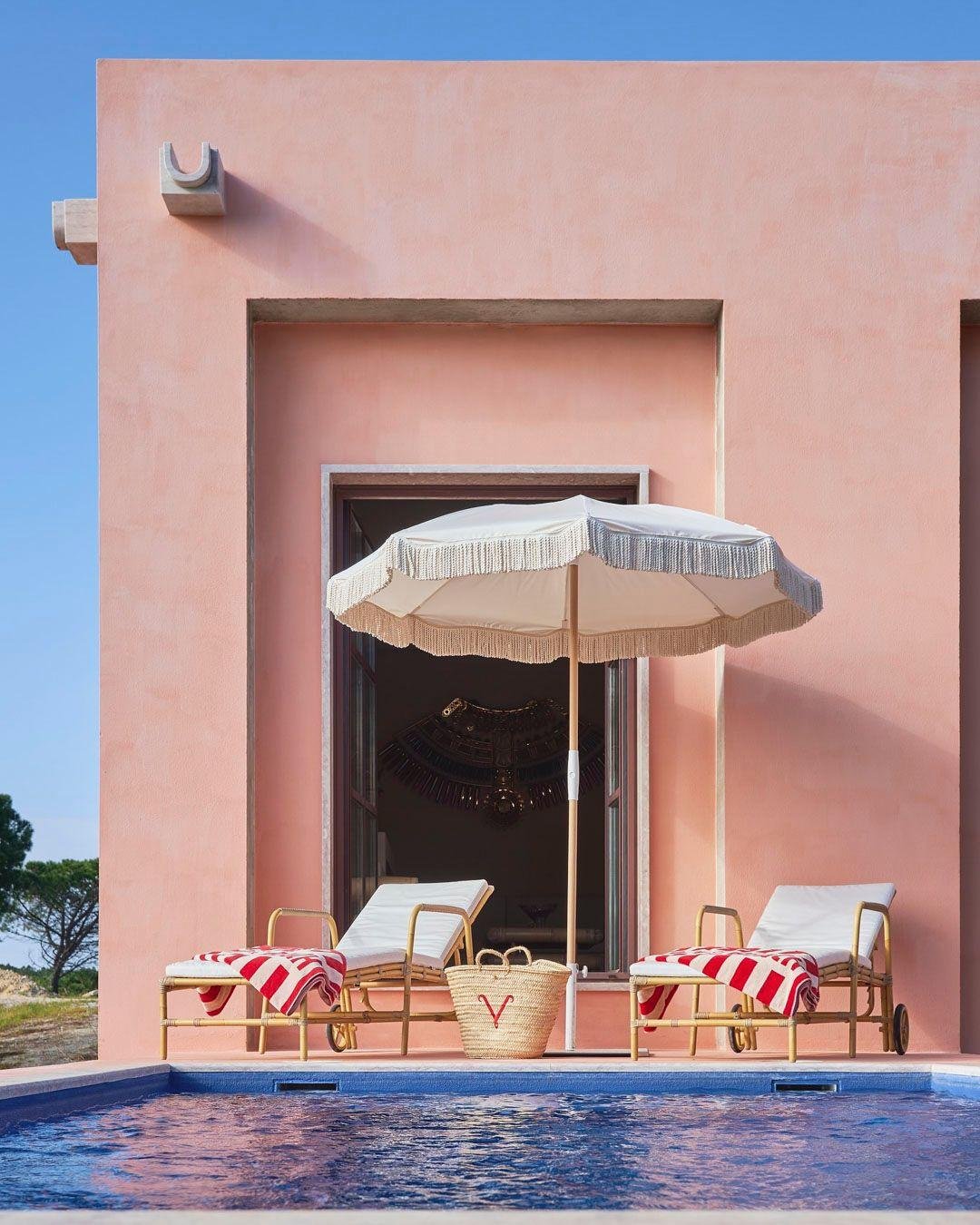 Christian Louboutin's first hotel is in a tiny coastal village in Portugal that most people have never heard of. Very on brand.

Vermelho means red in Portuguese, and Louboutin's signature color shows up exactly where you'd expect it. Each of the 13 