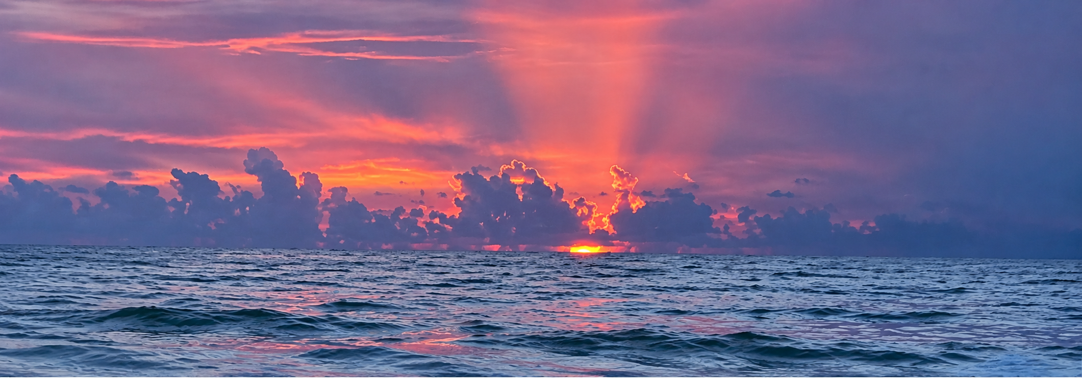 Radiant Sunset Over Open Ocean.png