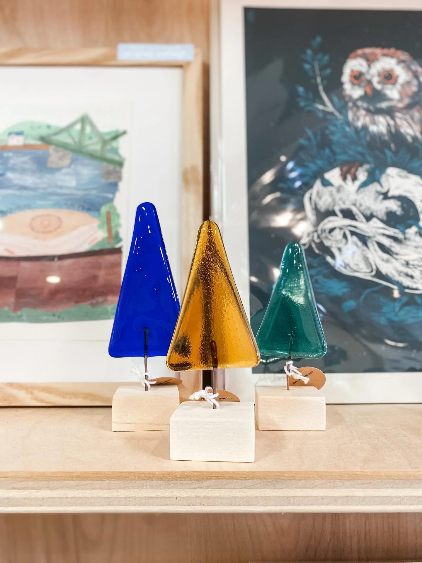 Jennifer Worden (@jenniferlwordenarts) shipped us a giant box of new glass art! Her sculptures are made from melting glass into her custom molds. She recently updated her tree molds and we love the new look! We have glass trees, birds and cacti in al