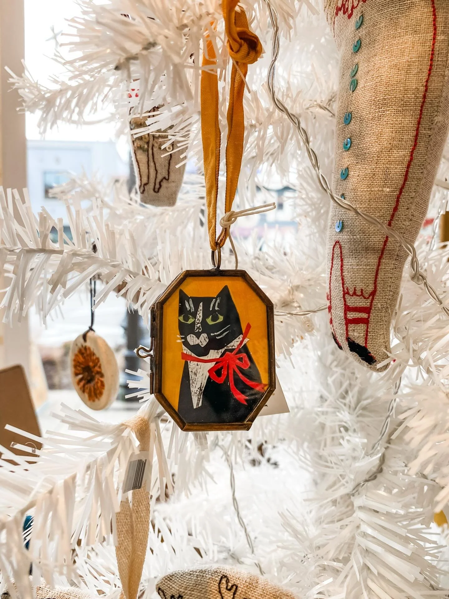 Did you know that we have not one, not two, but three trees filled with handmade ornaments in the shop? 🎄 Right next to our front windows, you&rsquo;ll find dozens of ornaments in all styles - from ceramic and hand-painted to lockets and lavender-st