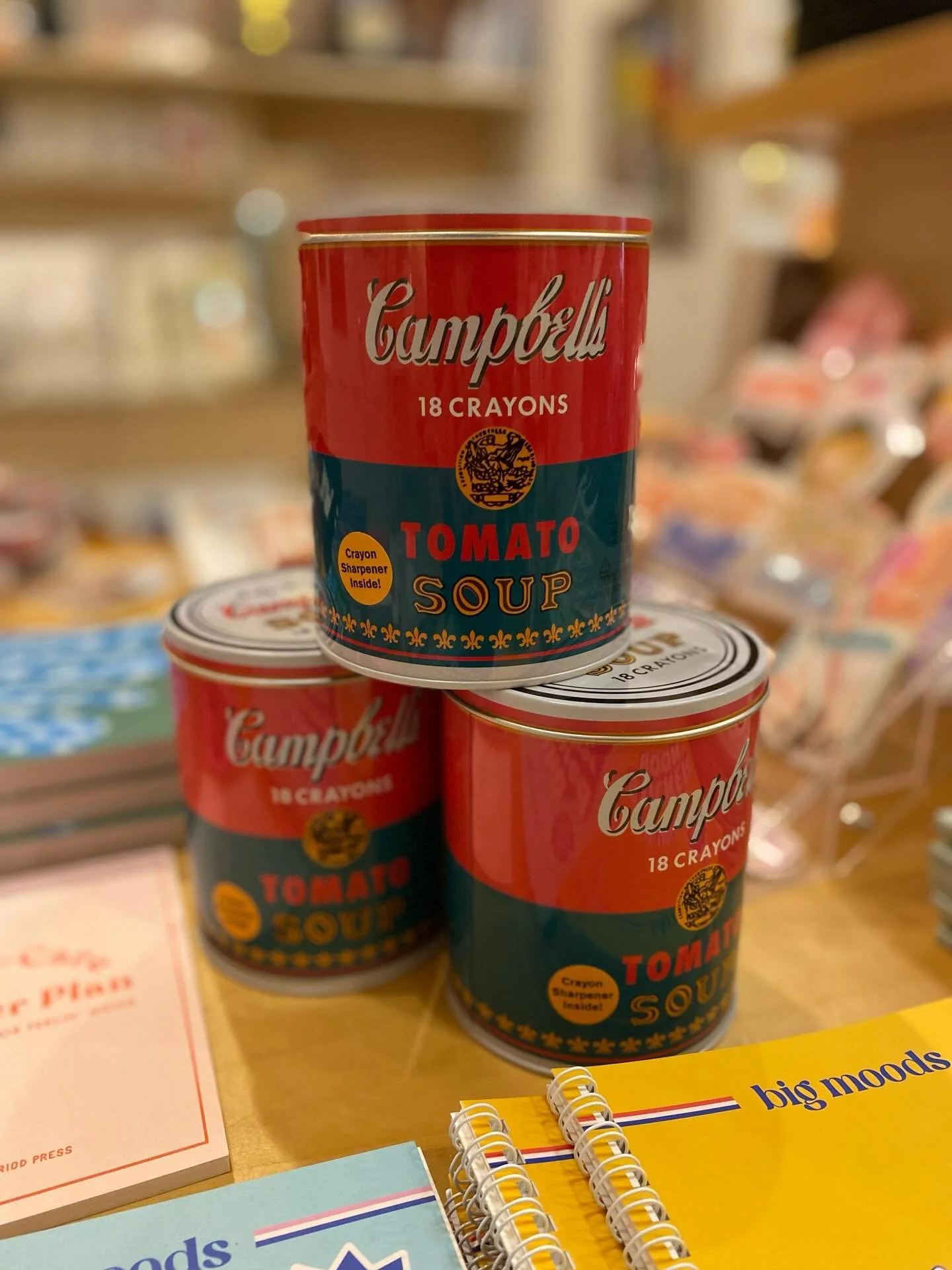 How cute are these cans of crayons!?! 🙌 We&rsquo;ve carried artful coloring books for years, but now we have a selection of colored pencils and crayons - perfect for gifting! 

Open extra late tonight until 10:00 pm!