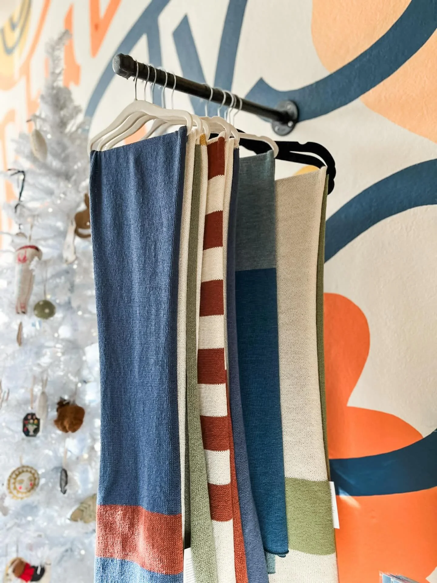 Heather of @dopefaceknits brought us new wool and cotton scarves just in time for Christmas! 🙌 Each piece is made in her home studio in Parkersburg using her vintage knitting machine using quality, sustainably-sourced fibers. Open today 10-7!