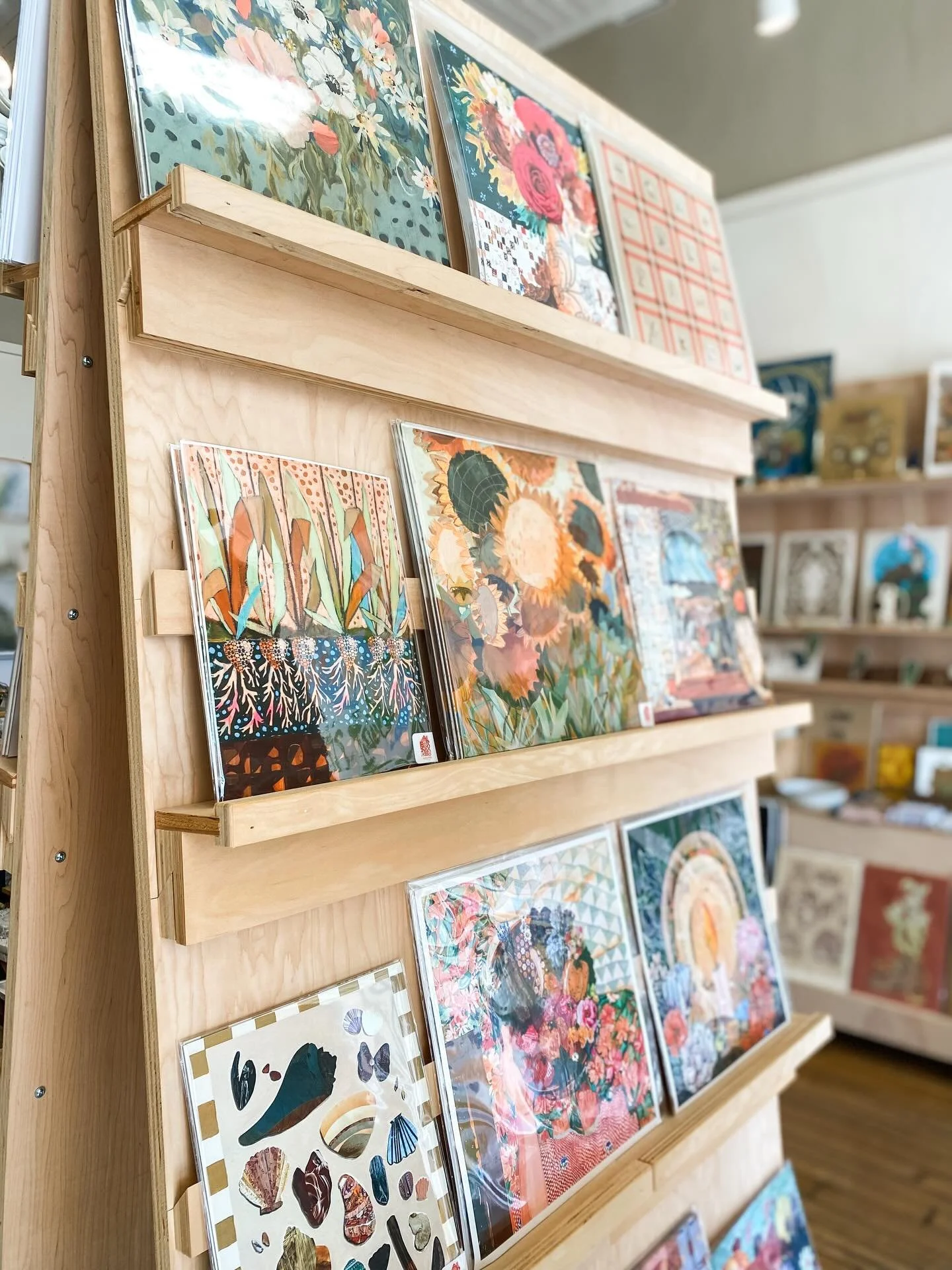 Unboxing days are the best days! 🙌 So excited to add gorgeous new prints by @laurenspired and restock her lovely stickers! Plus, we still have a selection of her original butterfly ornaments and framed butterfly boxes 🦋 Pop in and soak up some colo