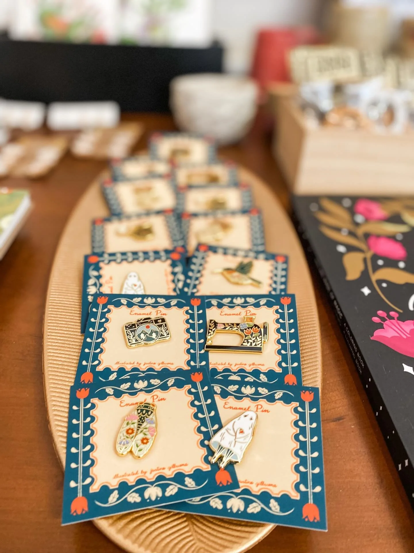 How lovely are these whimsical enamel pins from NY artist @justine.gilbuena?! 😍😍 We can&rsquo;t decide if we love the sewing machine or the cicada more - what do you think?