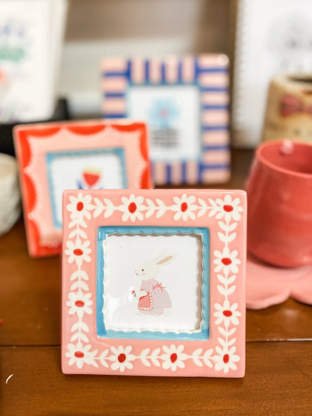 These adorable ceramic frames will add whimsy to any space! 🙌 We have four styles in the shop and I have a hard time picking a favorite. We&rsquo;re open 10-6!