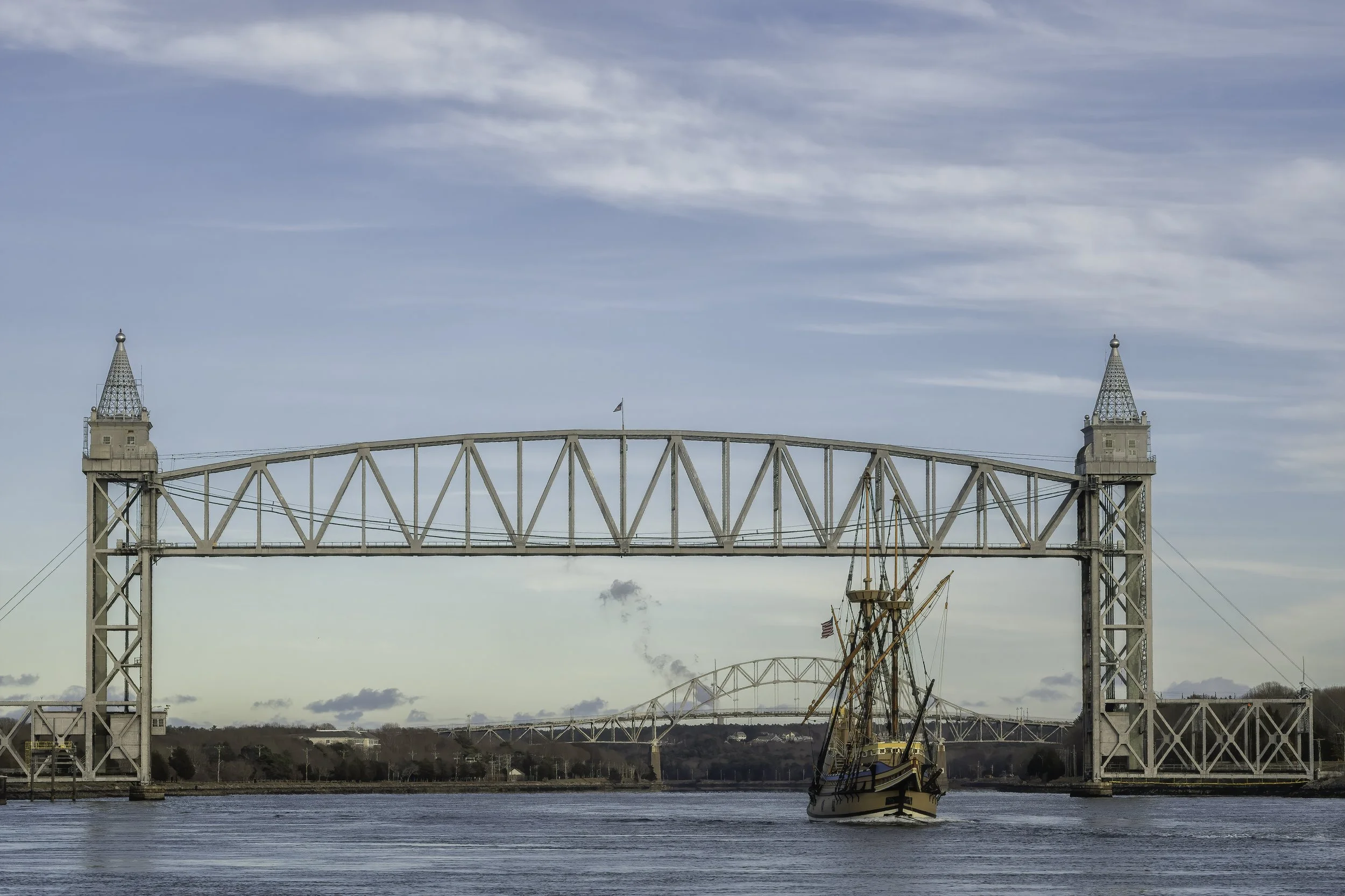 The Mayflower II traveling under the Railroad Bridge