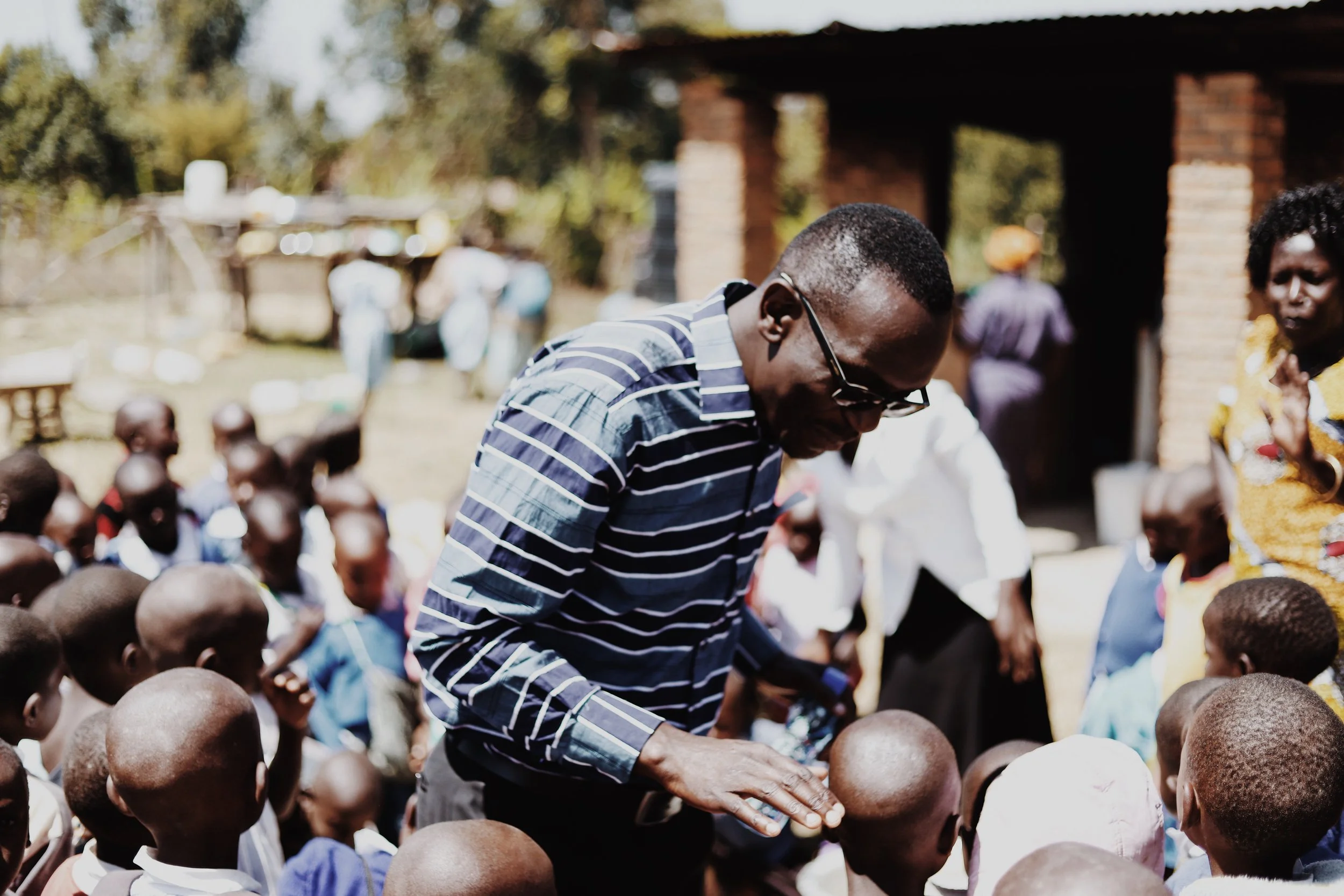 Victor with Luuya Students.JPG