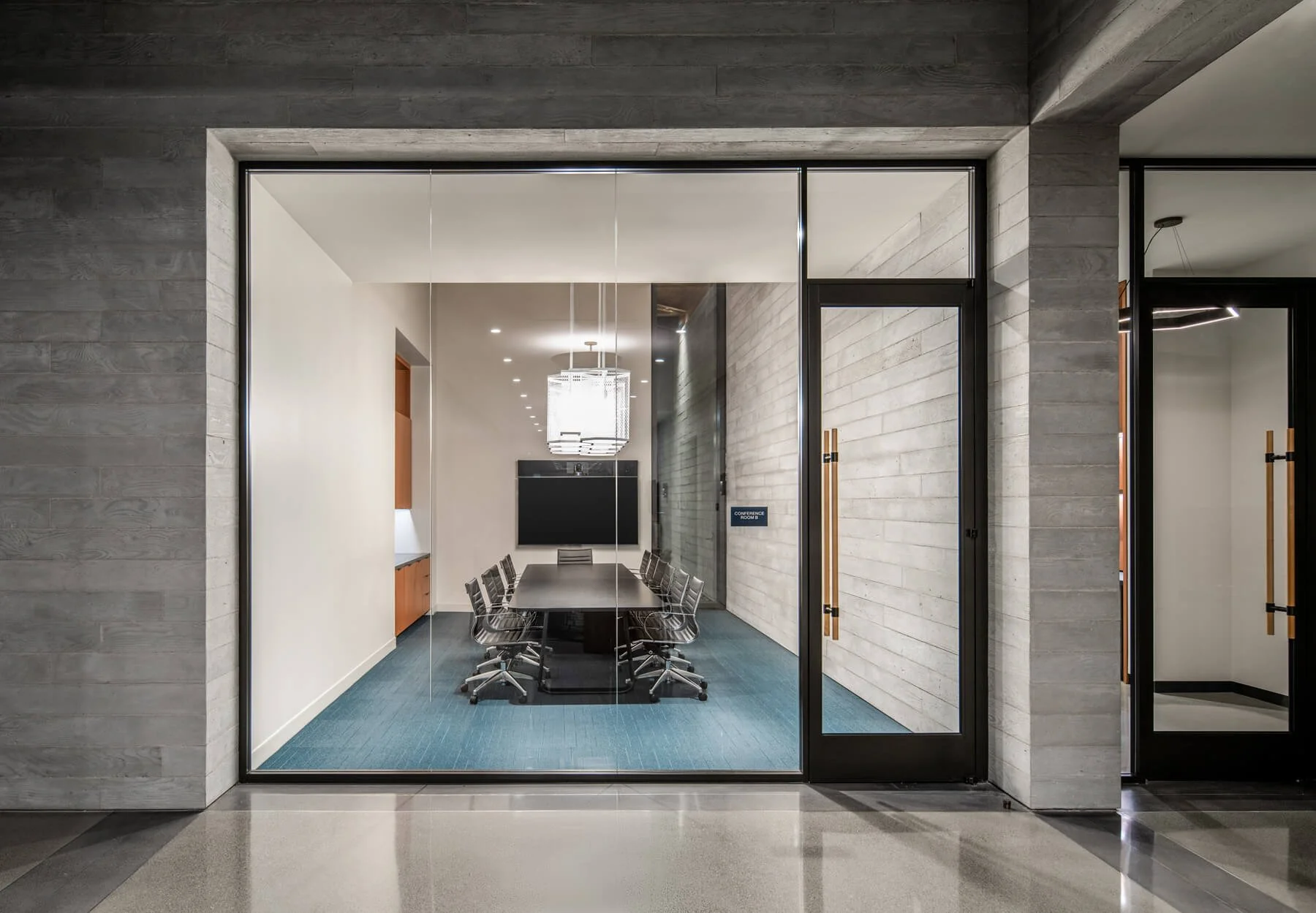 View of Conference Room B through glass wall