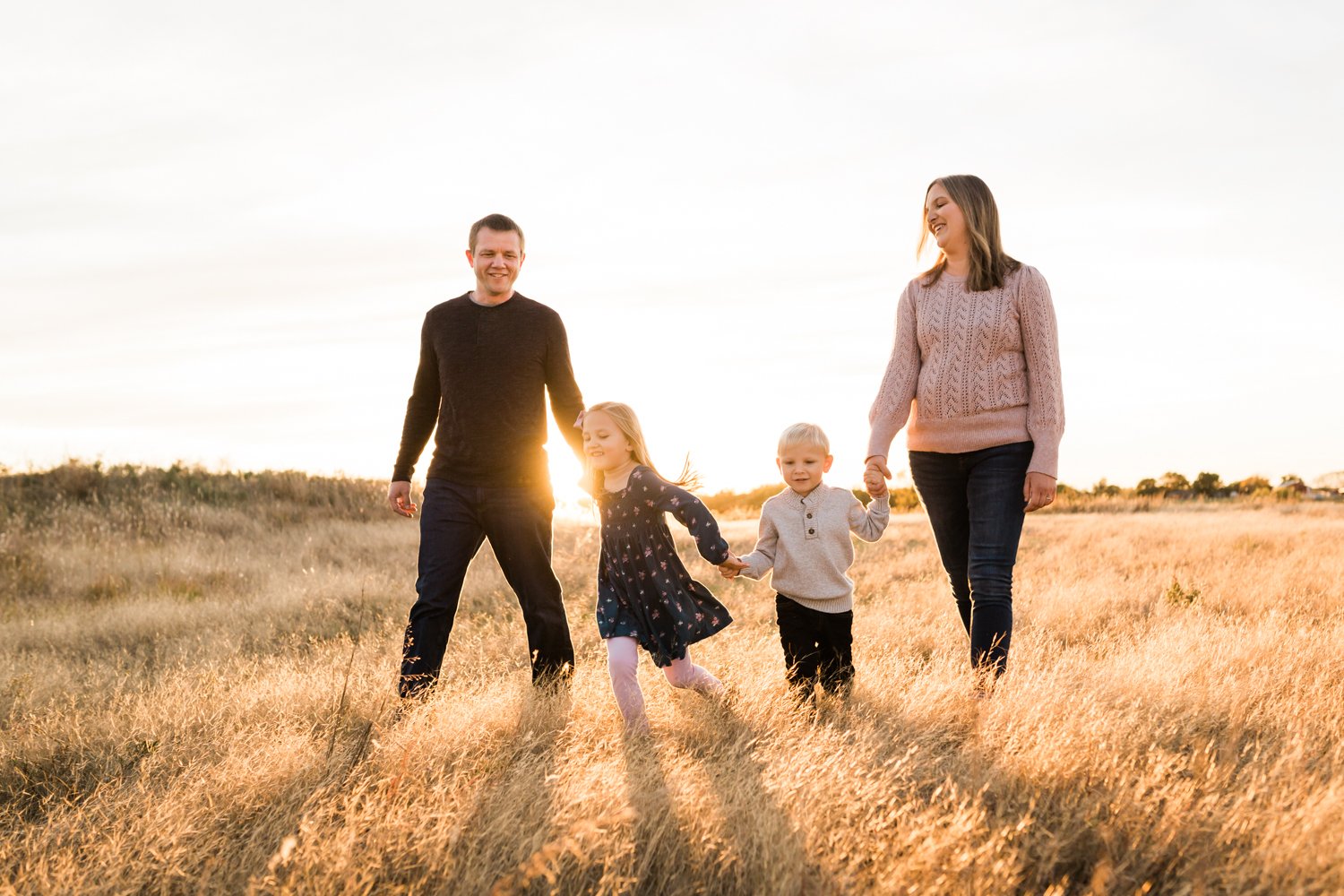 golden light outdoor fall family photo session on farm 