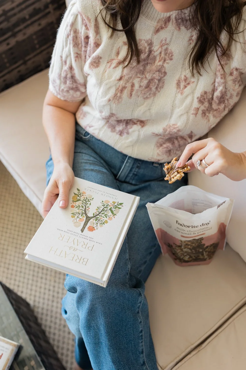 Lifestyle branding image of mortgage broker with her favorite snack