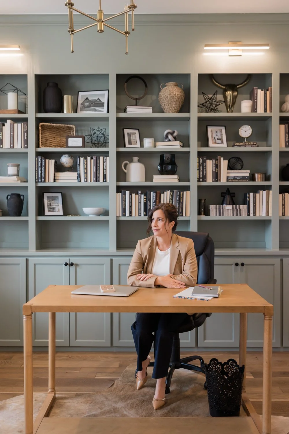 Elegant business portrait of mortgage loan officer in model home office