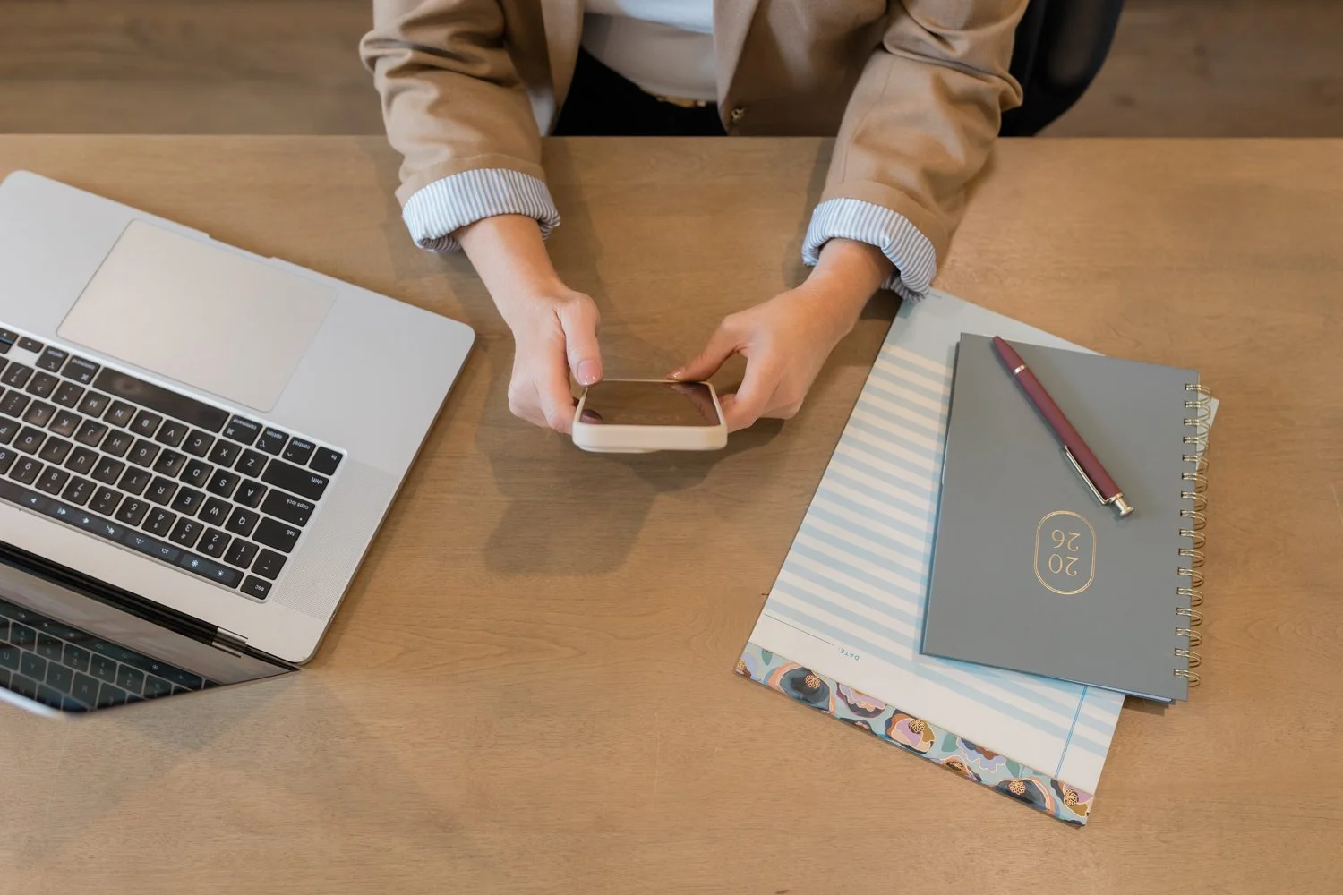 Woman working at home office desk during OKC branding session