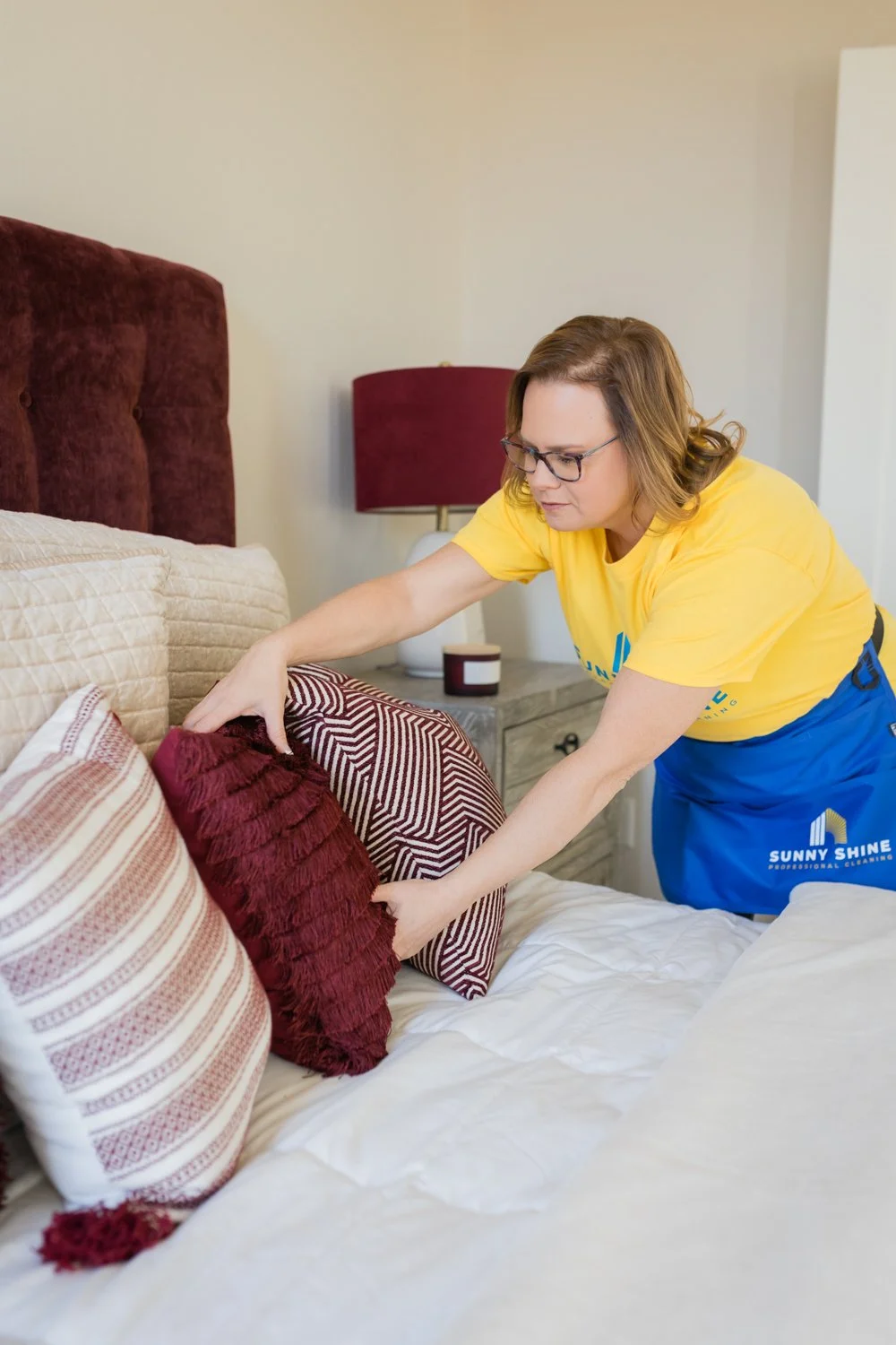 Business owner portrait in a bright, welcoming home environment