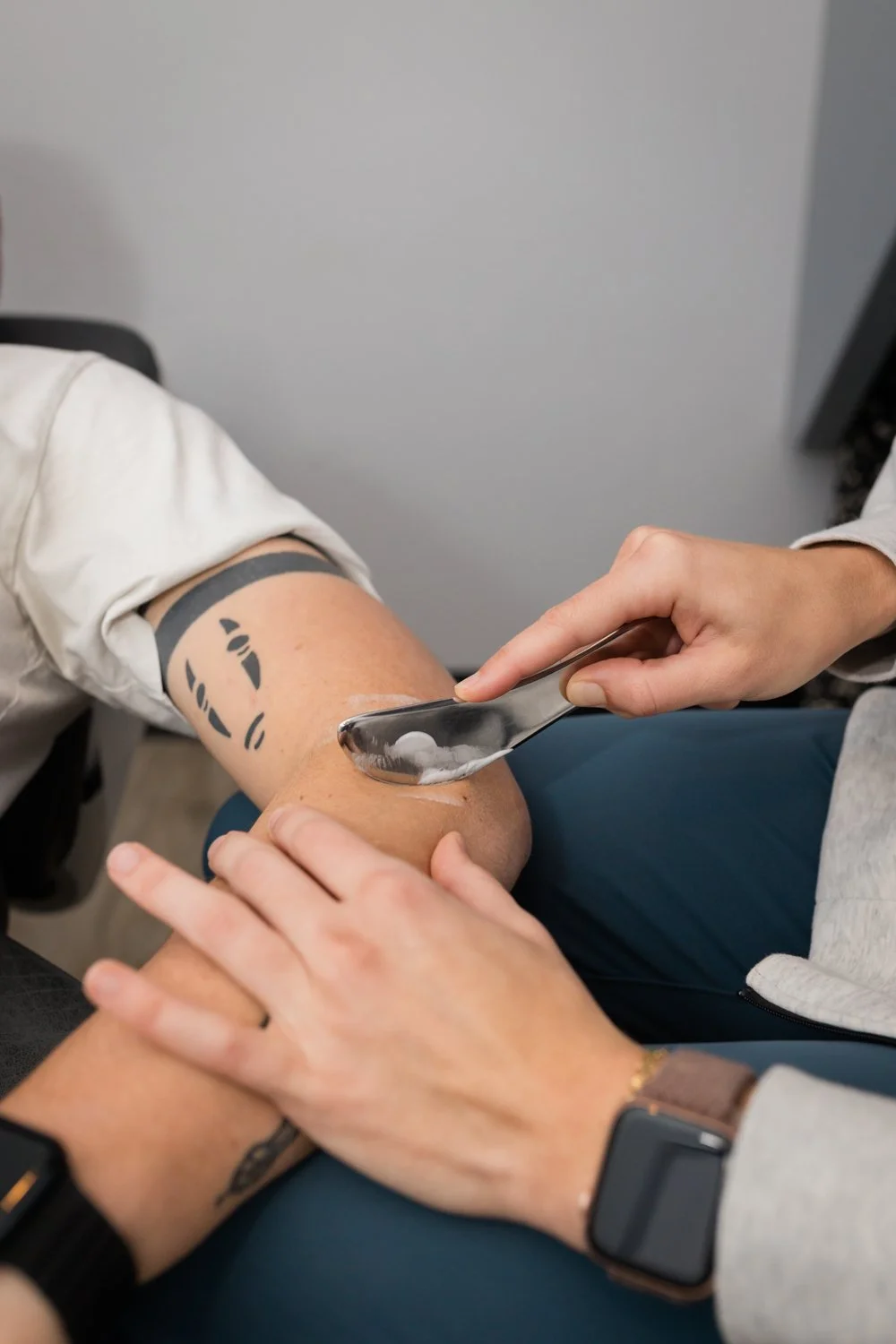 Detail shot of hands-on treatment during chiropractic adjustment session