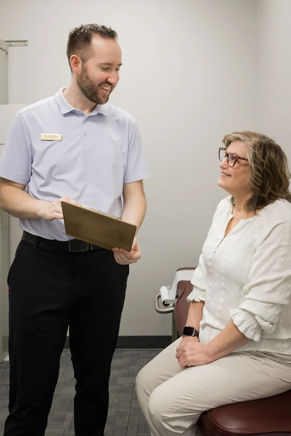 Candid moment between chiropractor and patient showing trust and connection
