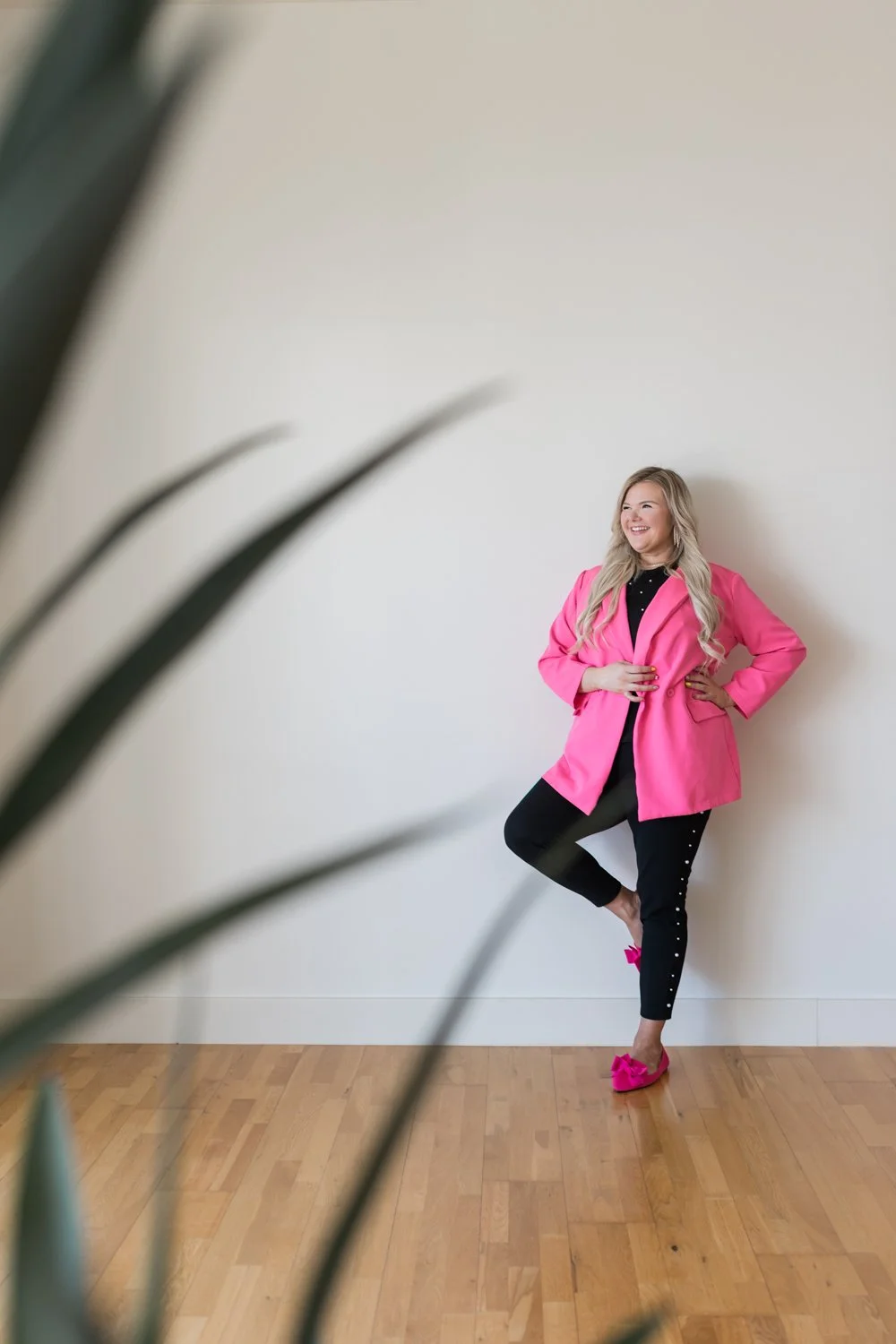 OKC brand photographer guiding client through intentional brand posing and direction