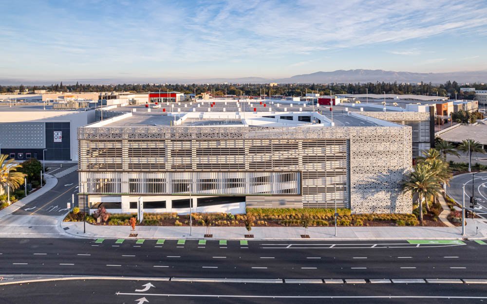 aerial view of a parking garage in san jose with a modern metal facade