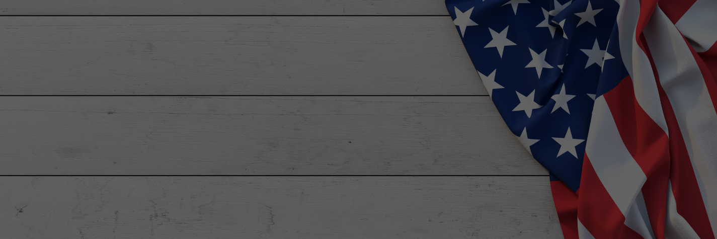 background photo of distressed white painted wood slats with an American flag along the side