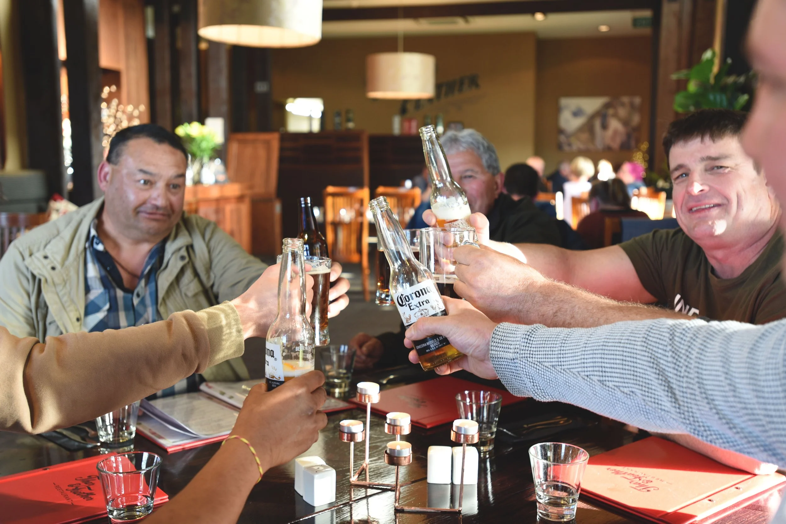 Thar and feather Toasting shot.jpeg