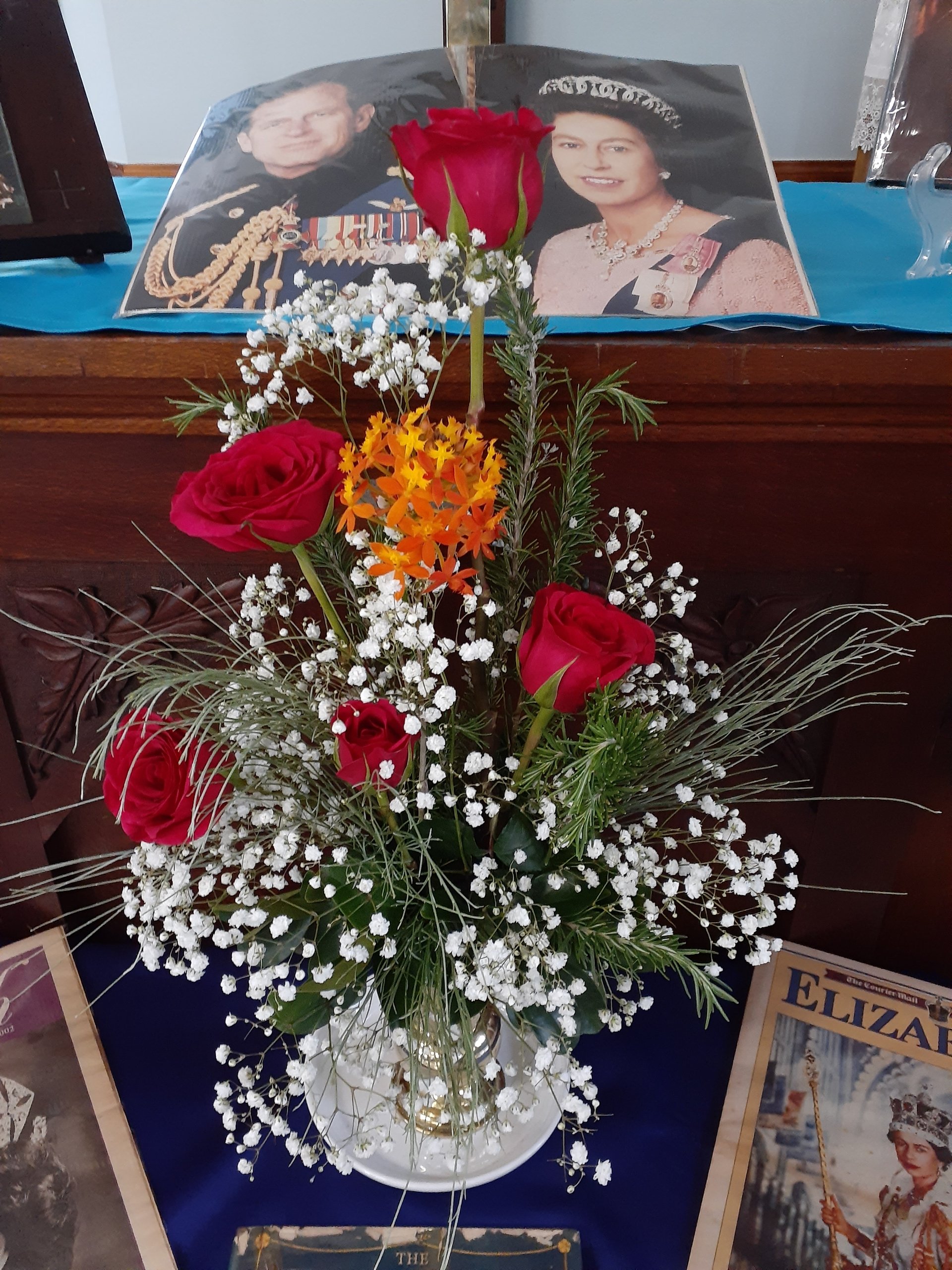  Floral Tribute to Queen Elizabeth II: Roses for royalty, crucifix orchid for Defender of Faith, grevillea for Queen of Australia 