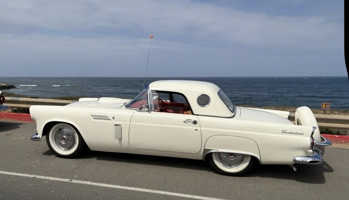 White 1956 Thunderbird with porthole hardtop and continental kit in California