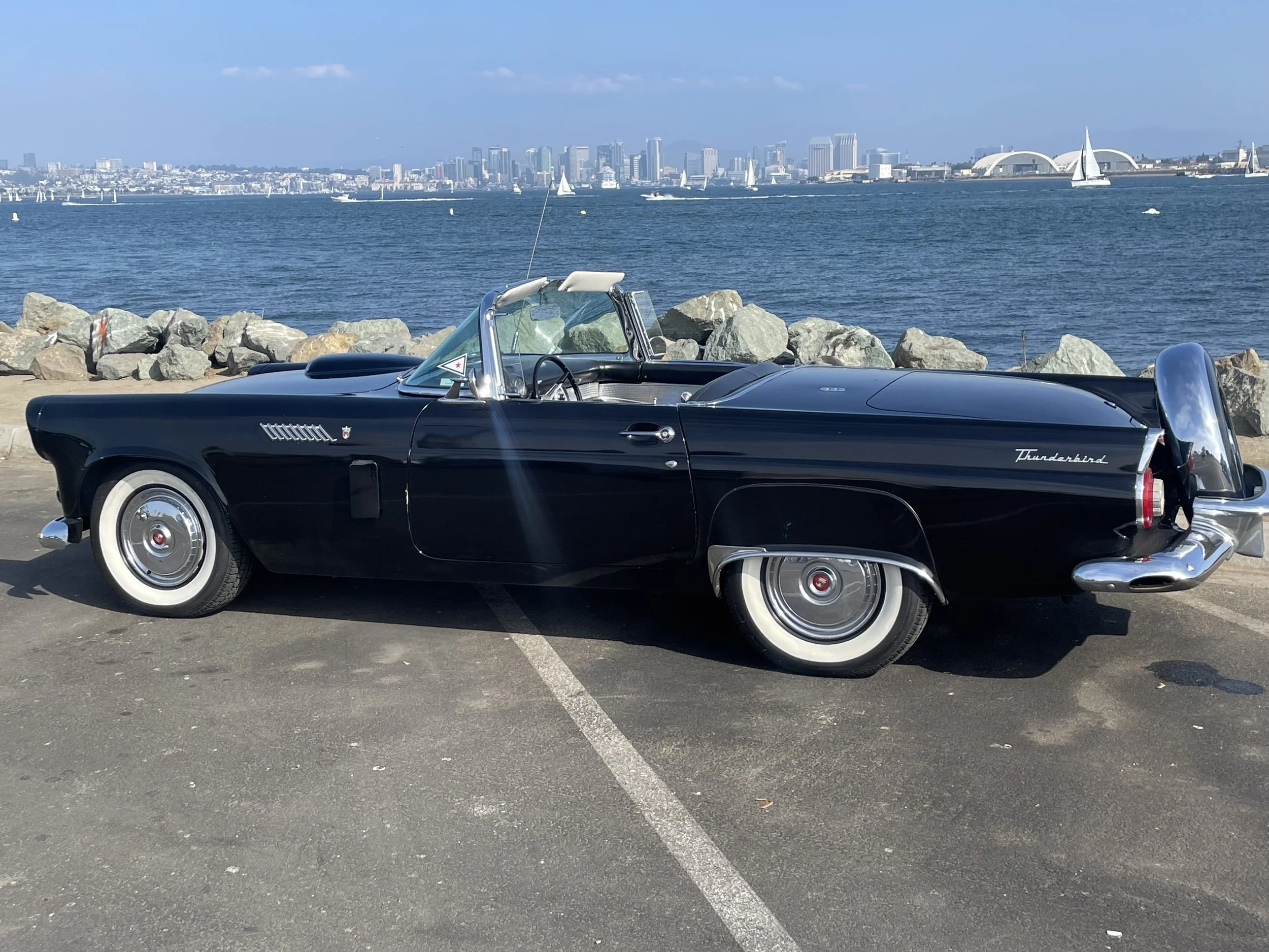 Michael's 56 black convertible Tbird with continental kit in San Diego by the bay