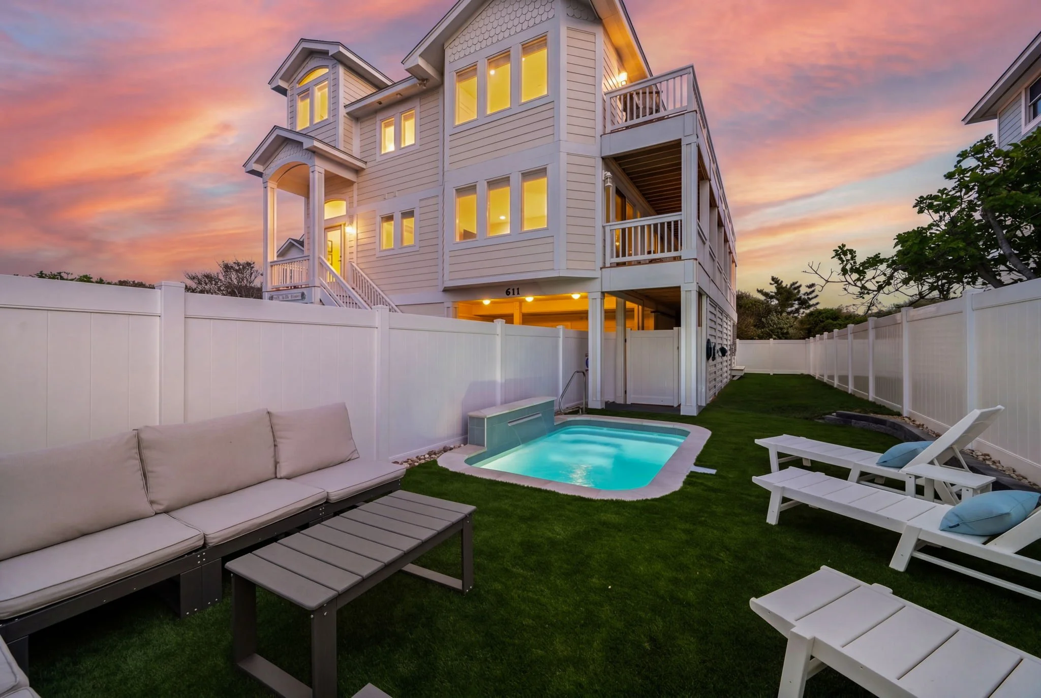 102-web-or-mls-611-Sea-Oats-Private-Pool-Twilight-V3.jpg