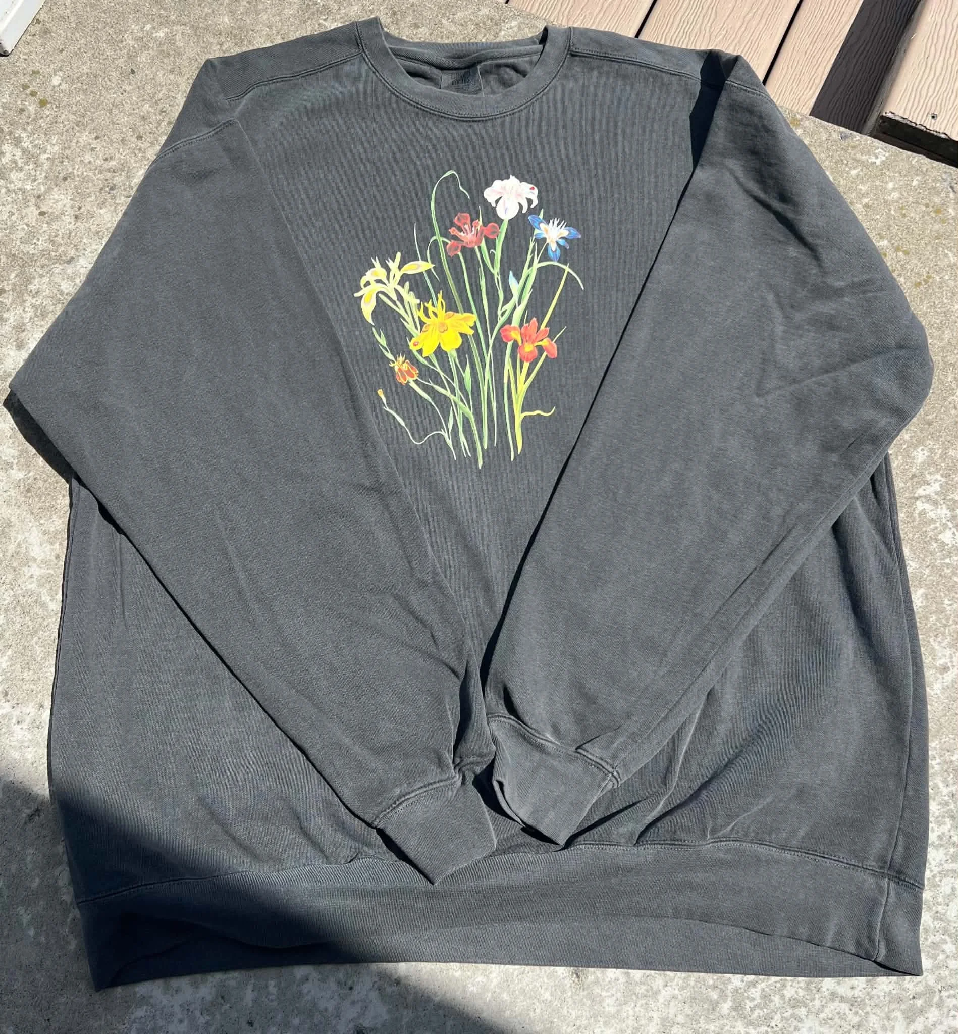 Gray sweatshirt with wildflower bloom