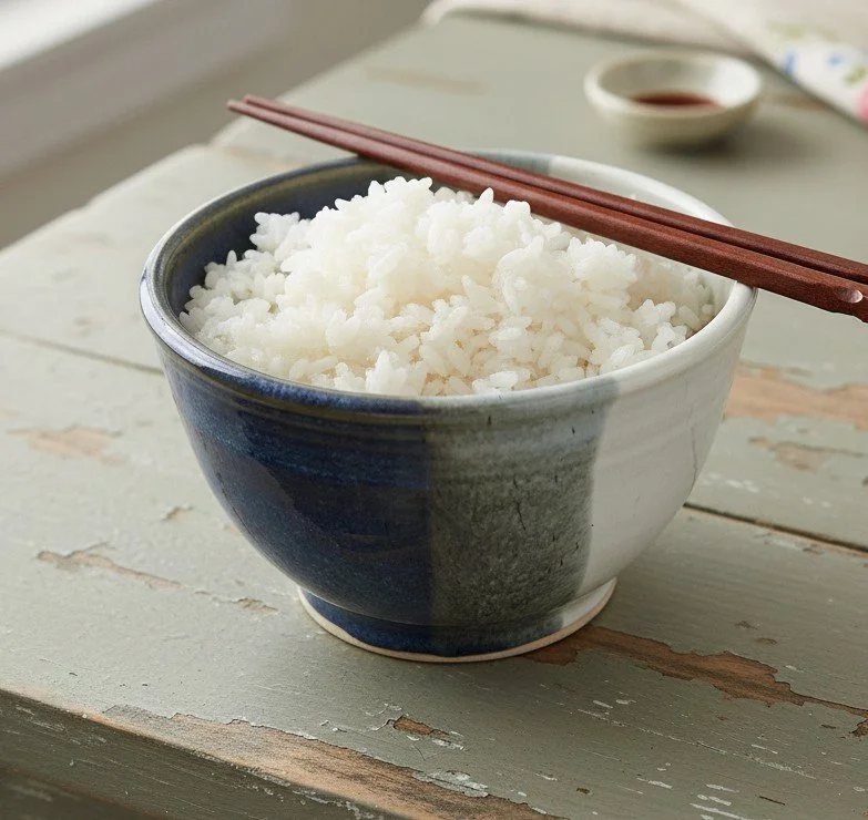 ivory twilight rice bowl with chopsticks.jpeg